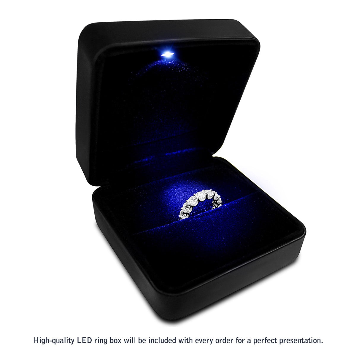 A lab-grown diamond eternity ring in a black LED-lit presentation box.