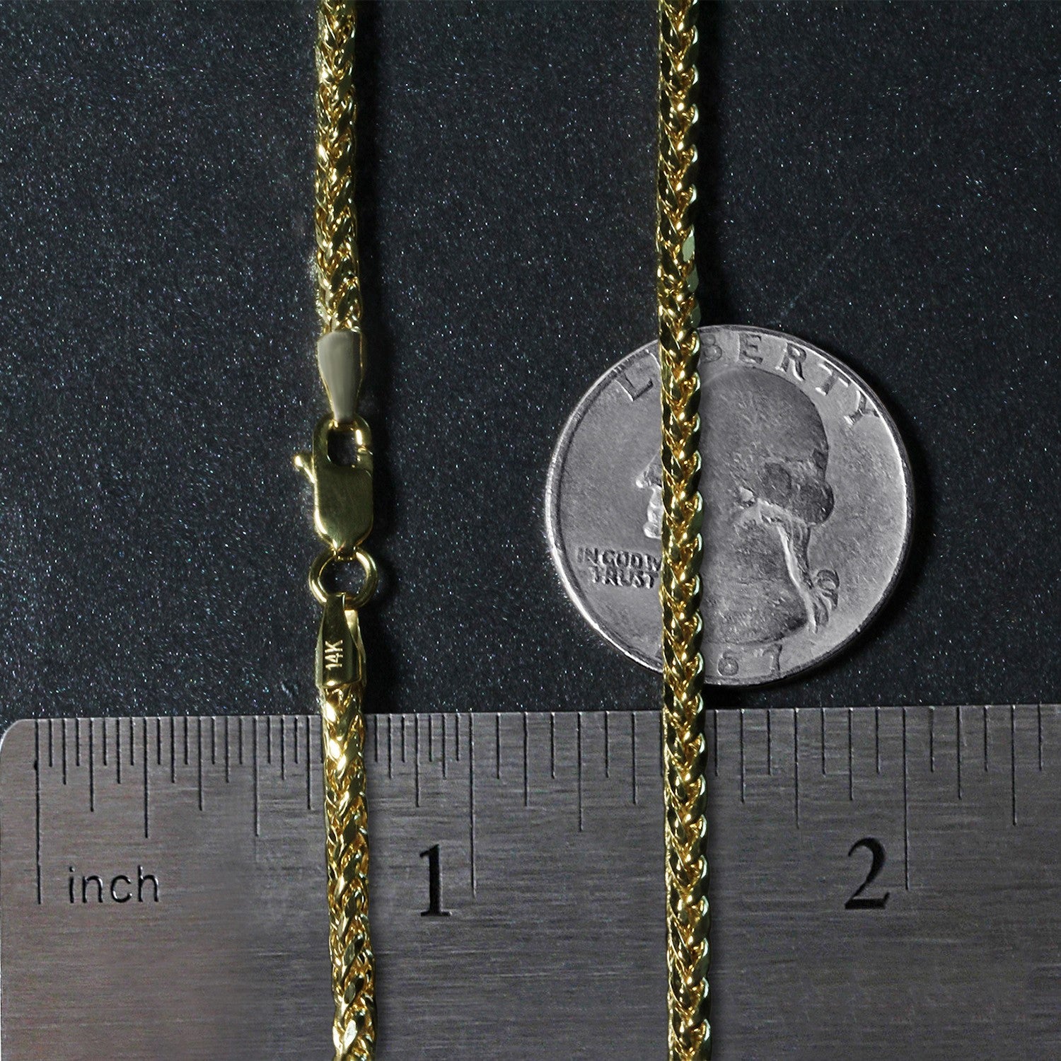 A 14k yellow gold diamond-cut round Franco chain with a lobster clasp.