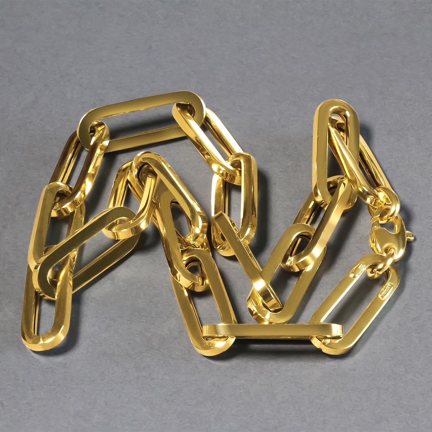 14k yellow gold extra wide paperclip chain necklace with polished links.