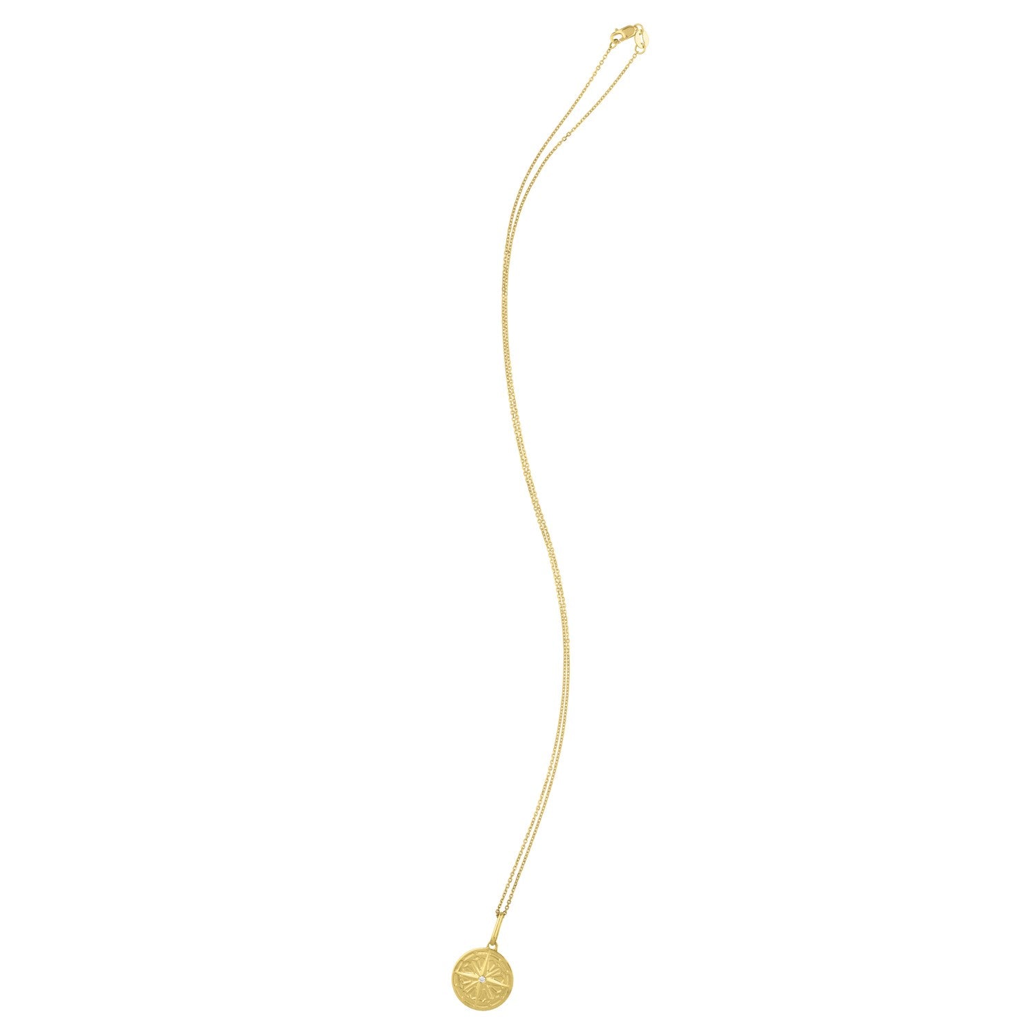 A 14K yellow gold North Star talisman necklace with a round pendant.