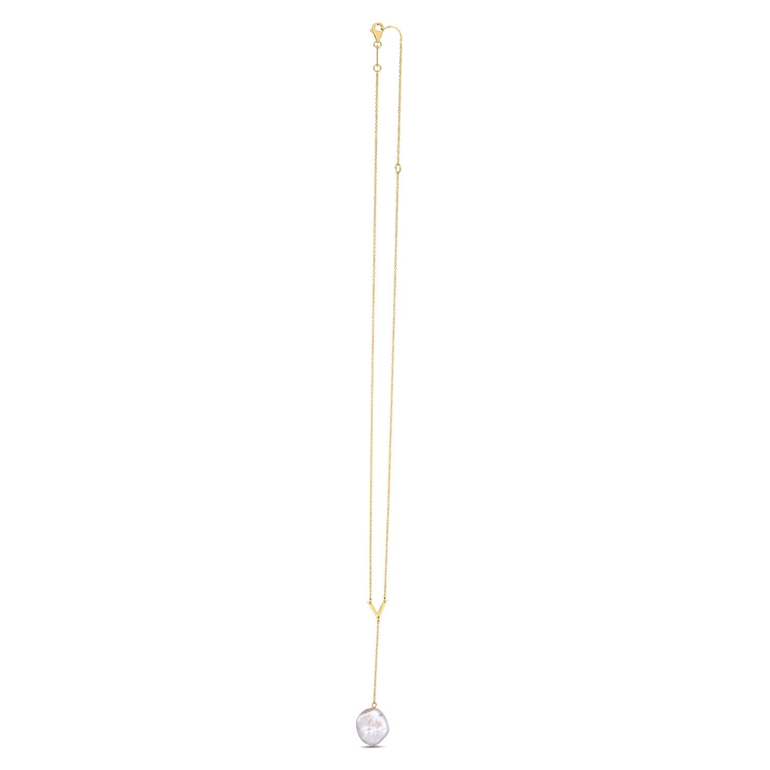 A 14k yellow gold lariat necklace with a single baroque pearl drop.