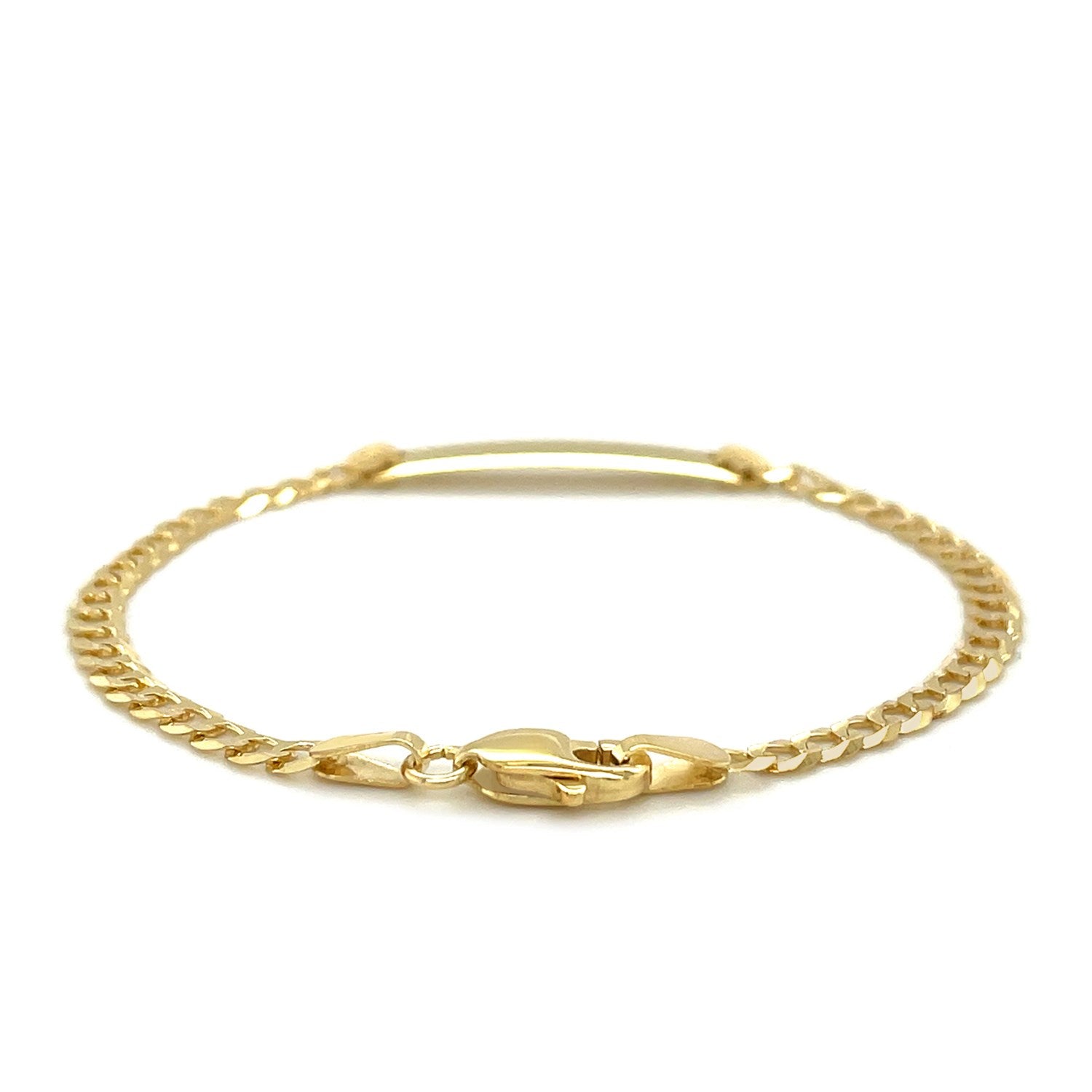 14k yellow gold curb link children's ID bracelet with a lobster clasp.