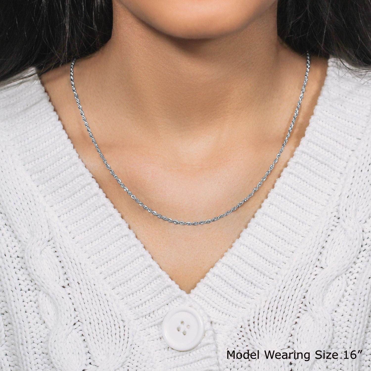 A 14k white gold light rope chain, 2.00 mm wide, worn by a model.