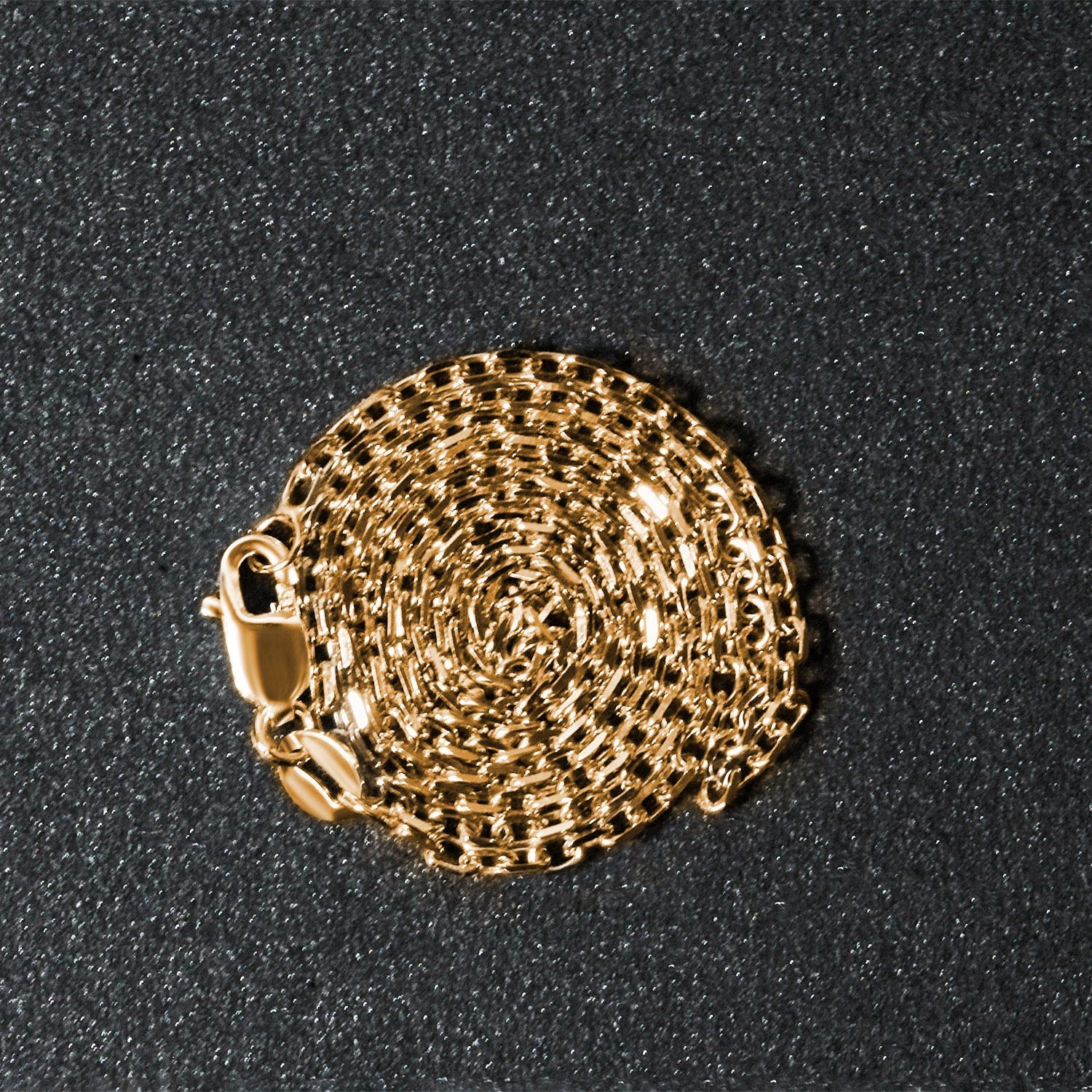 18k yellow gold diamond cut cable link chain with a lobster clasp.