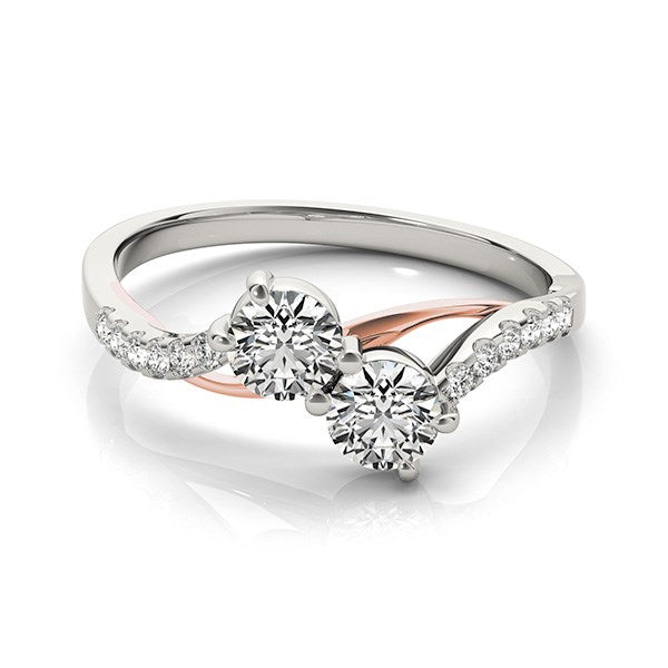 Two-stone diamond ring with a curved band in 14k white and rose gold.