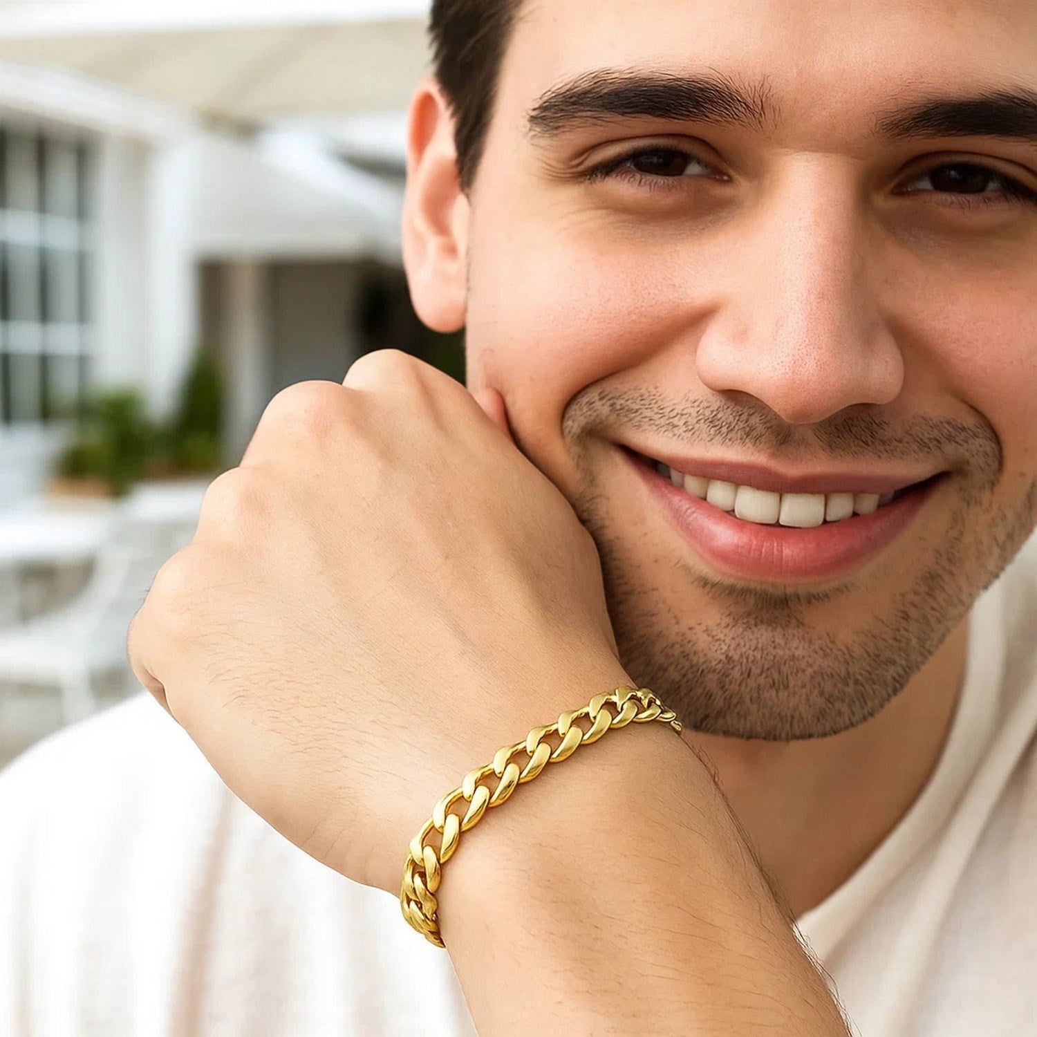 10k yellow gold light Miami Cuban bracelet on a man's wrist.