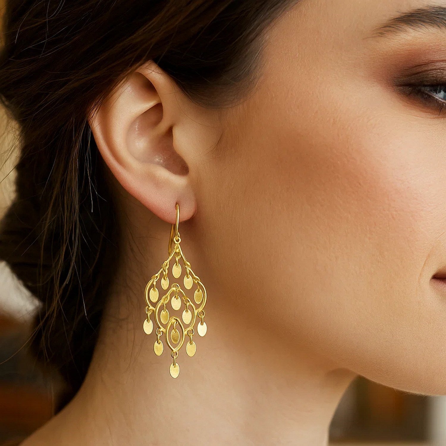 14K yellow gold polished chandelier earring with open oval shapes.