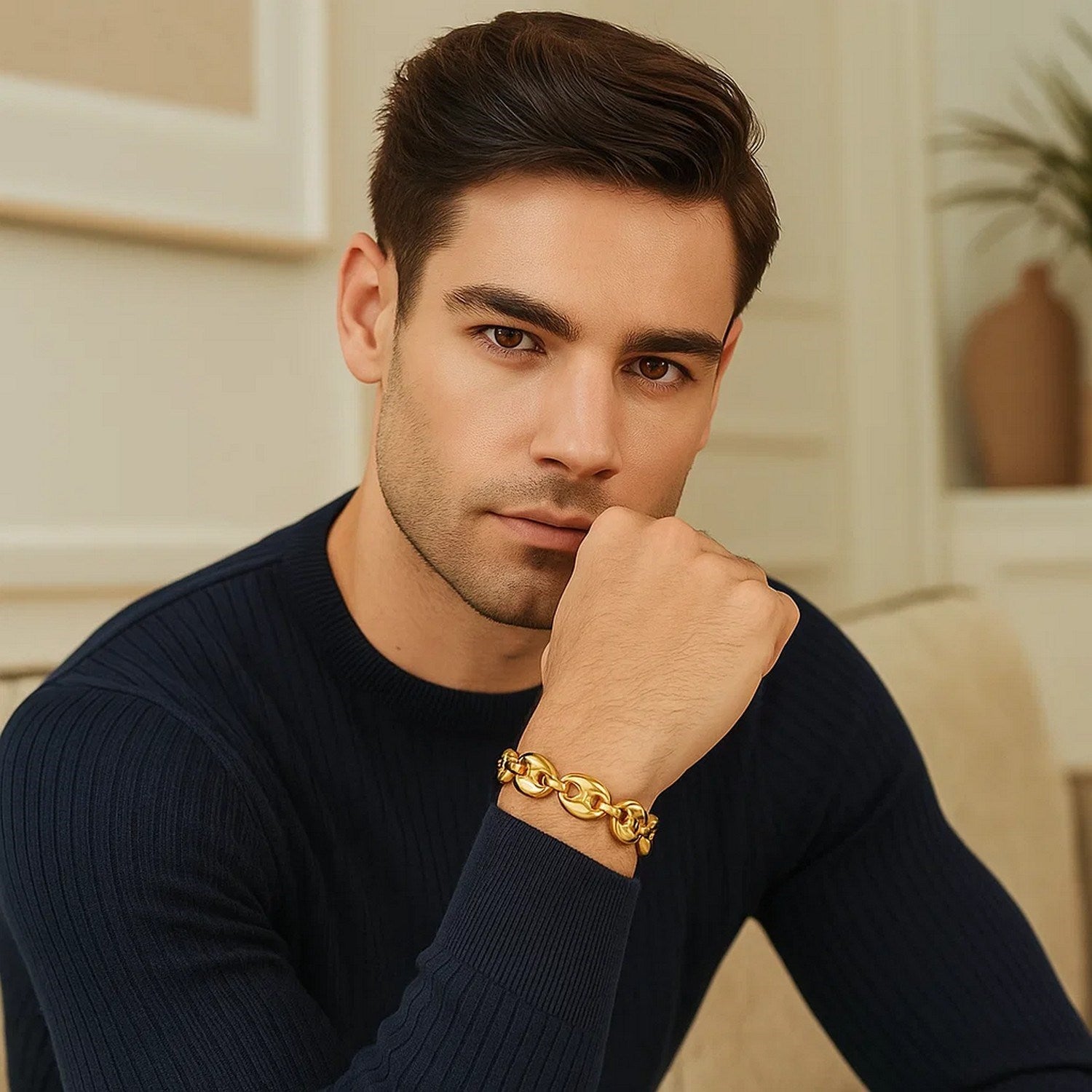14k yellow gold high polish lite puffed mariner link bracelet on a man's wrist.