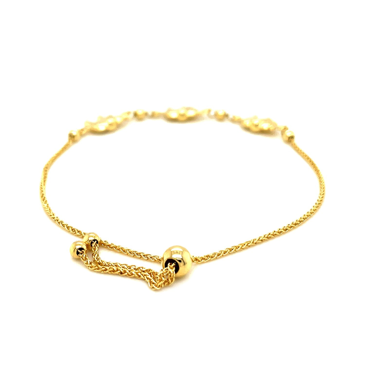 14k yellow gold elephant station lariat style bracelet with a drawstring closure.