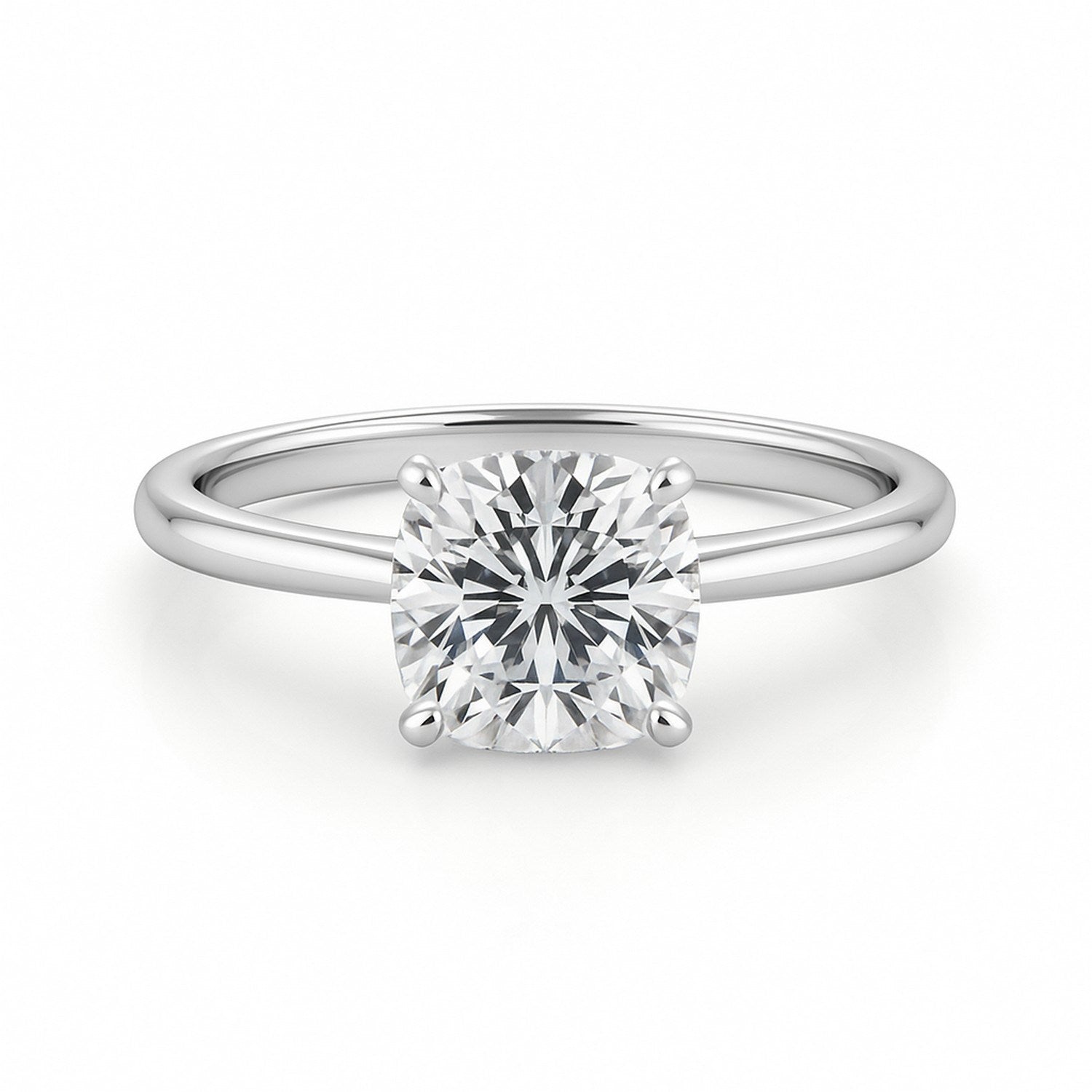 A cushion-cut lab-grown diamond solitaire ring in 14K white gold.