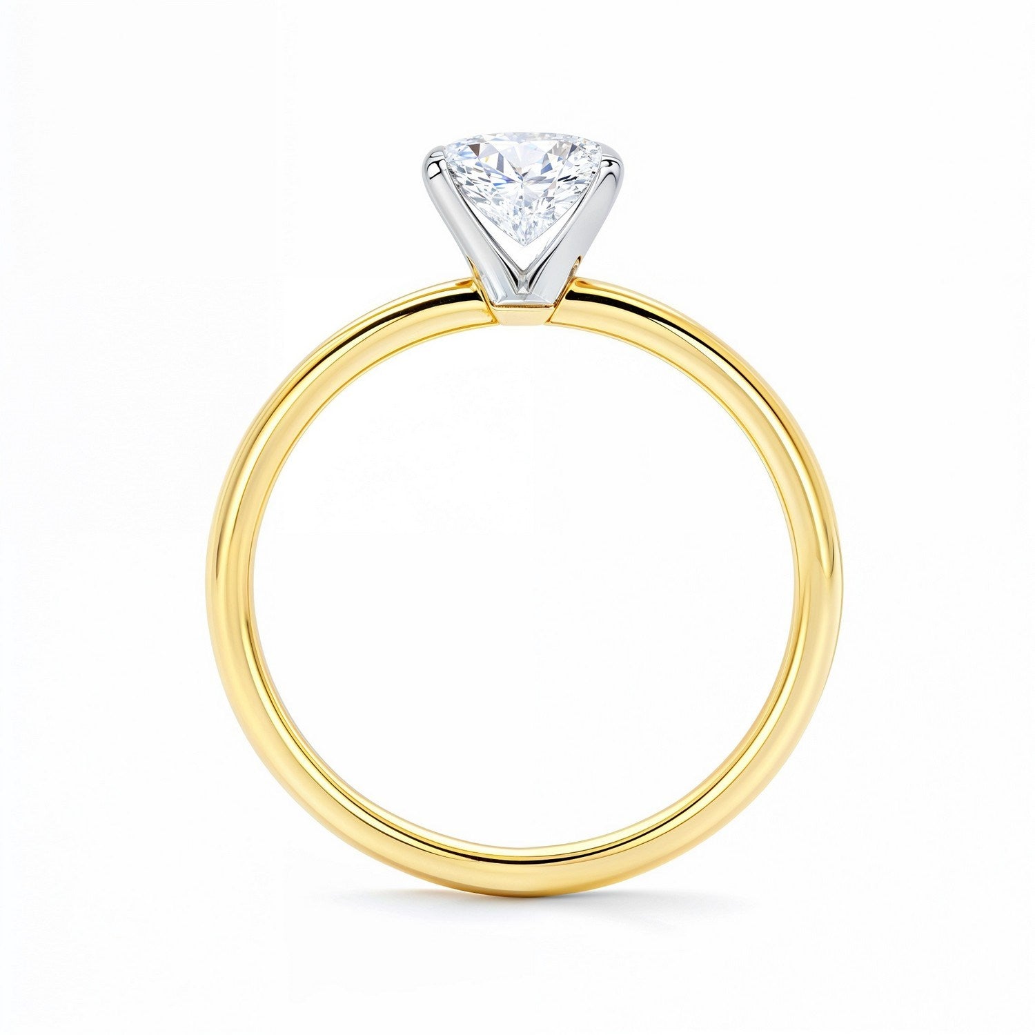 A radiant lab-grown diamond solitaire ring with a yellow gold band and white gold prongs.