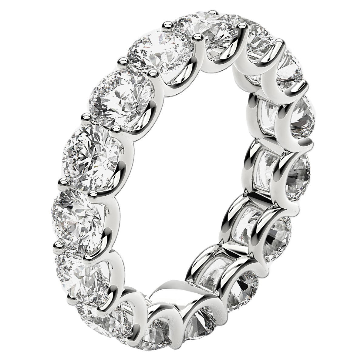 Round cut lab grown diamond eternity ring in 14k white gold with curved prongs.