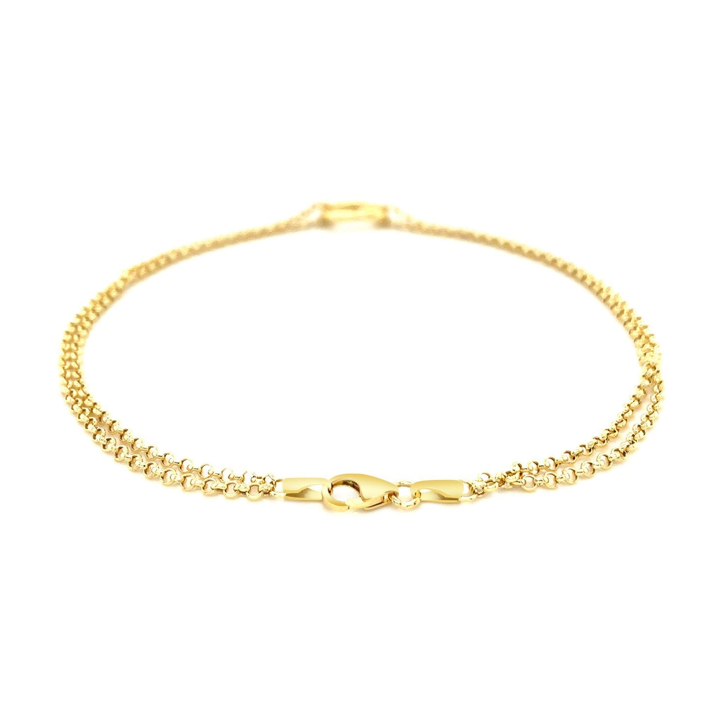 10k yellow gold double rolo chain anklet with an open heart station and lobster clasp.