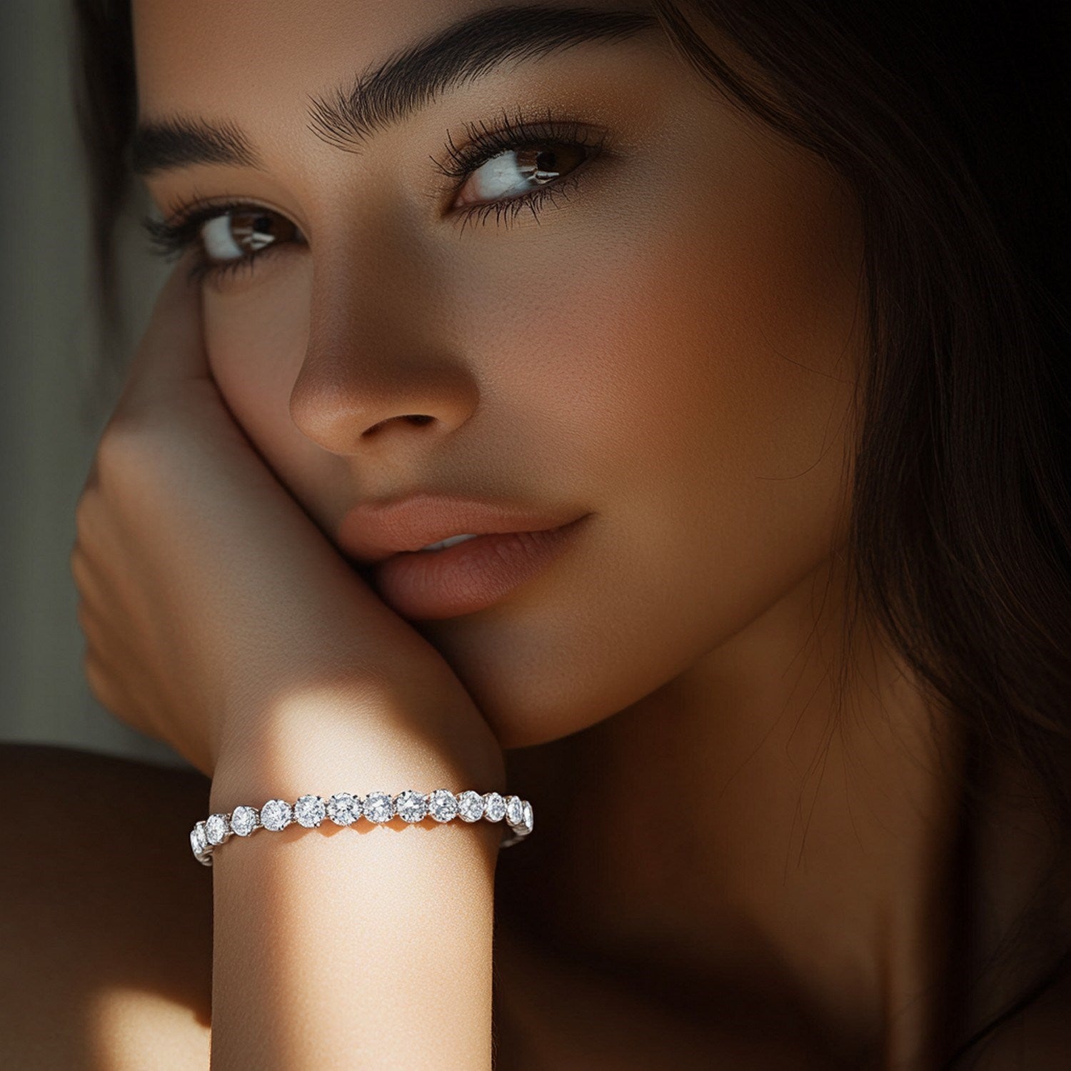 Lab Grown Round Diamond Tennis Bracelet in 14k White Gold on a woman's wrist.