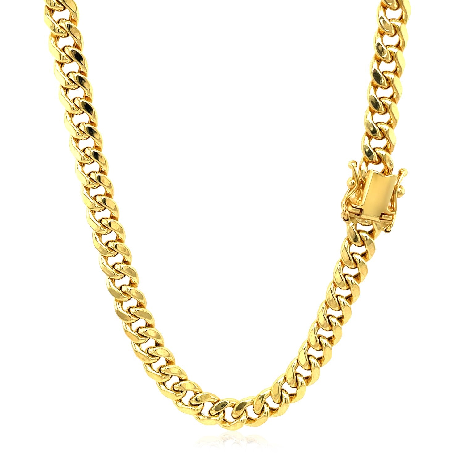 A 14k yellow gold semi-solid Miami Cuban chain with a box clasp.