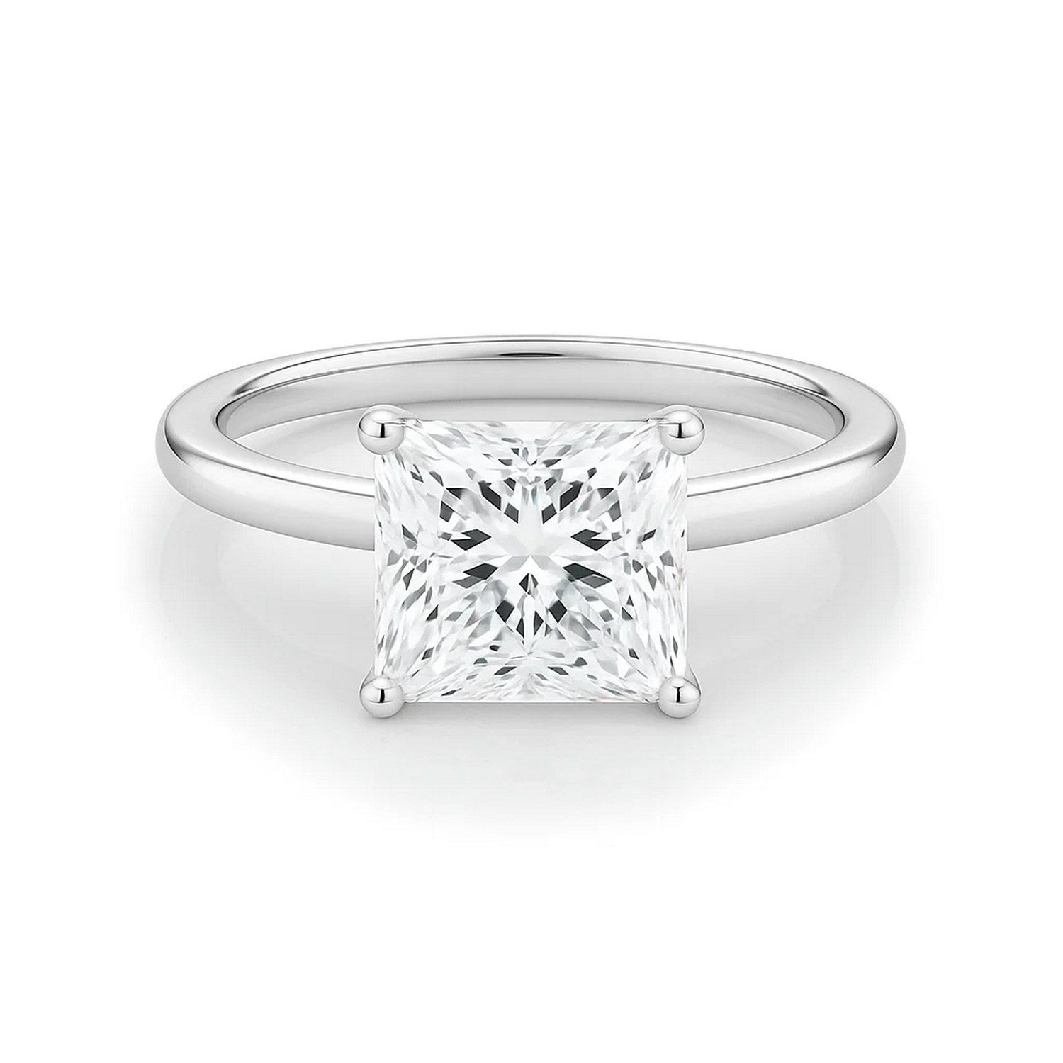 A 10K white gold solitaire ring with a princess-cut lab-grown diamond.