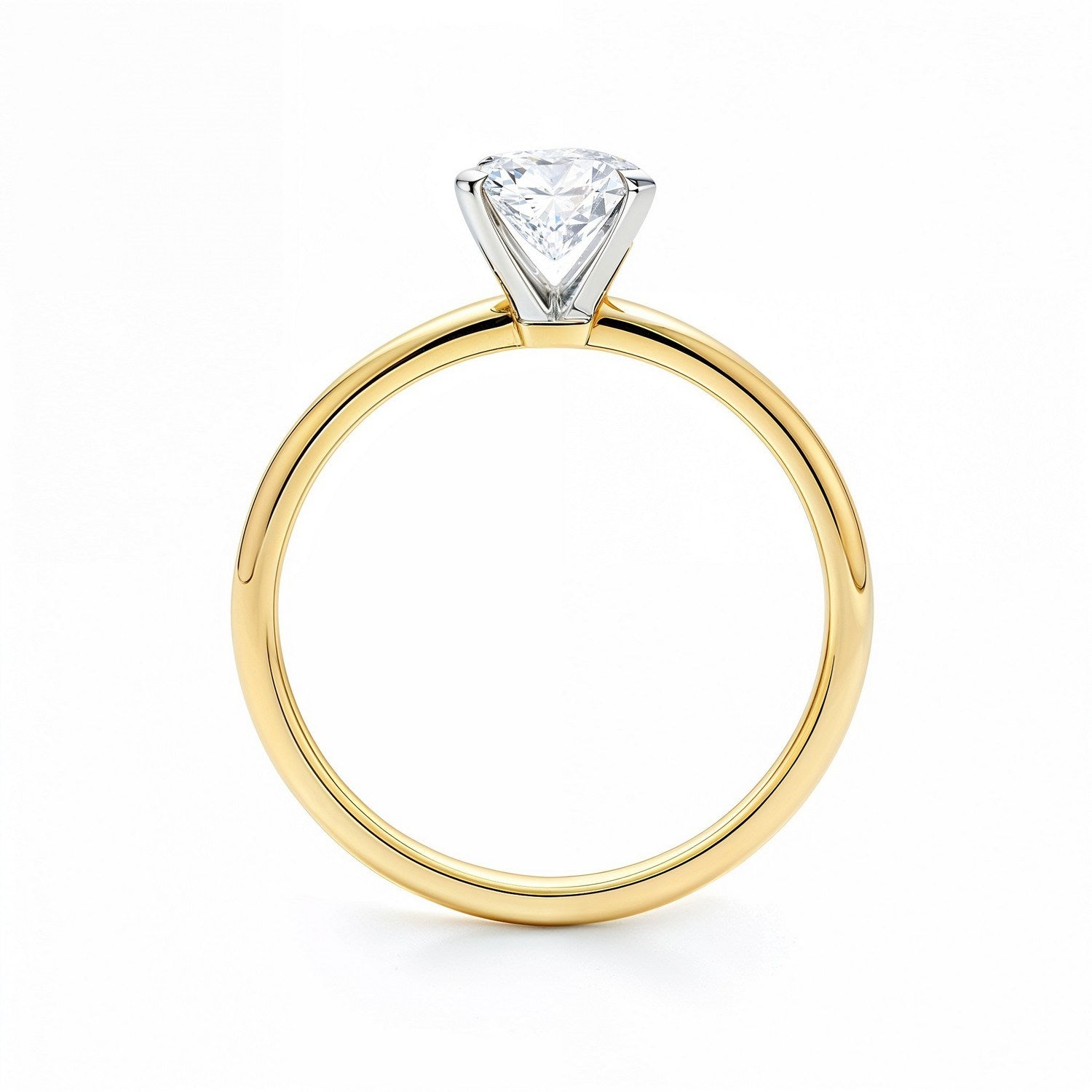 A radiant lab-grown diamond solitaire ring with a yellow gold band and white gold prongs.