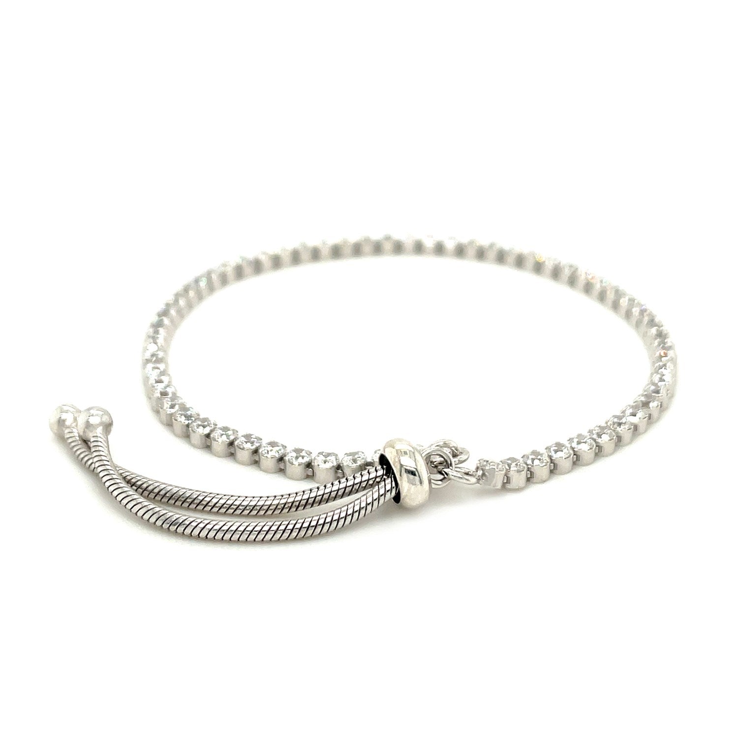 Adjustable sterling silver tennis bracelet with round cubic zirconia stones.