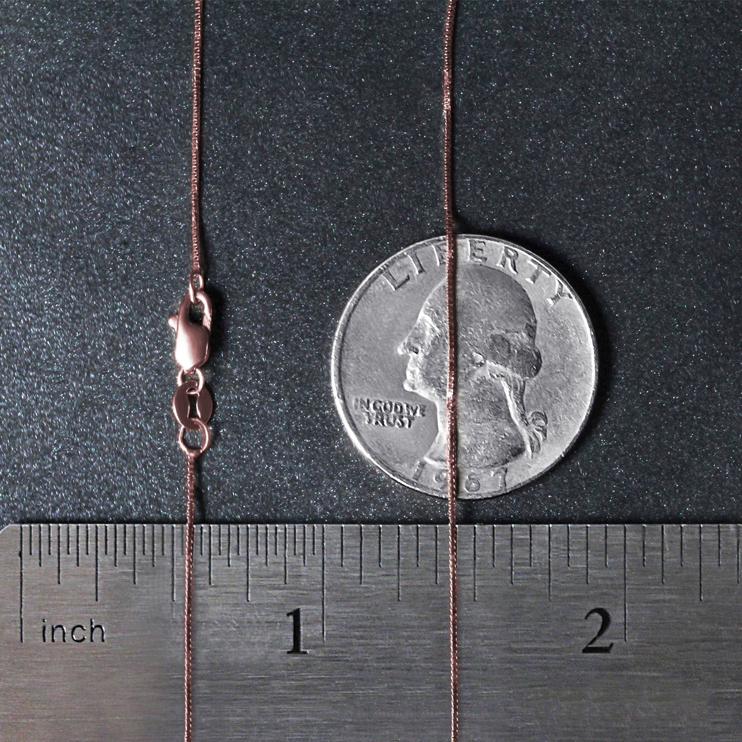 18k rose gold classic box chain with a lobster clasp, shown with a ruler and coin.