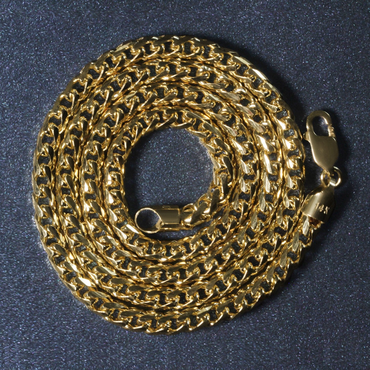 14k yellow solid gold diamond cut round Franco chain with a lobster clasp.