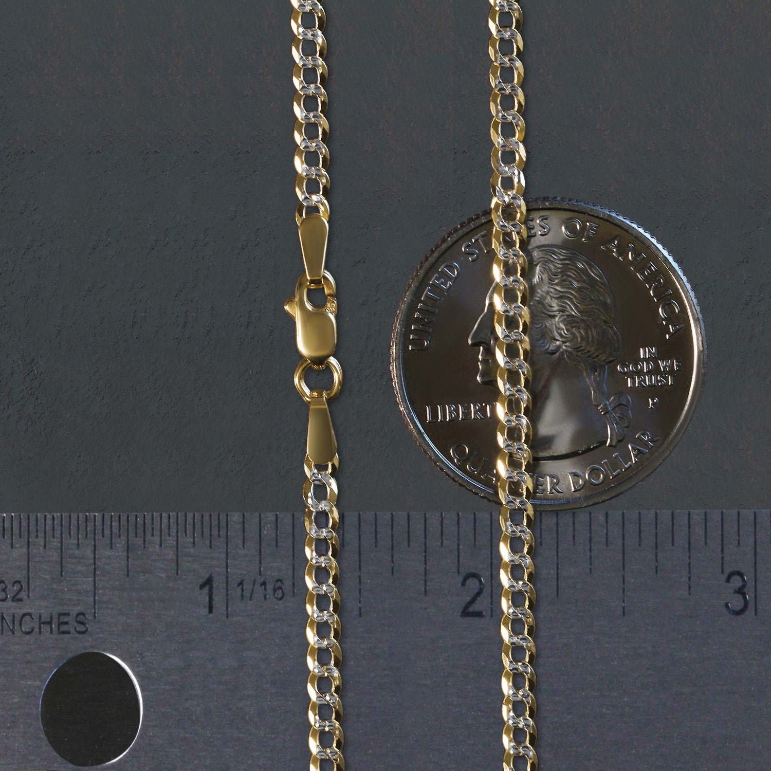 14k two-tone gold pave curb chain with a lobster clasp, shown with a ruler and quarter.
