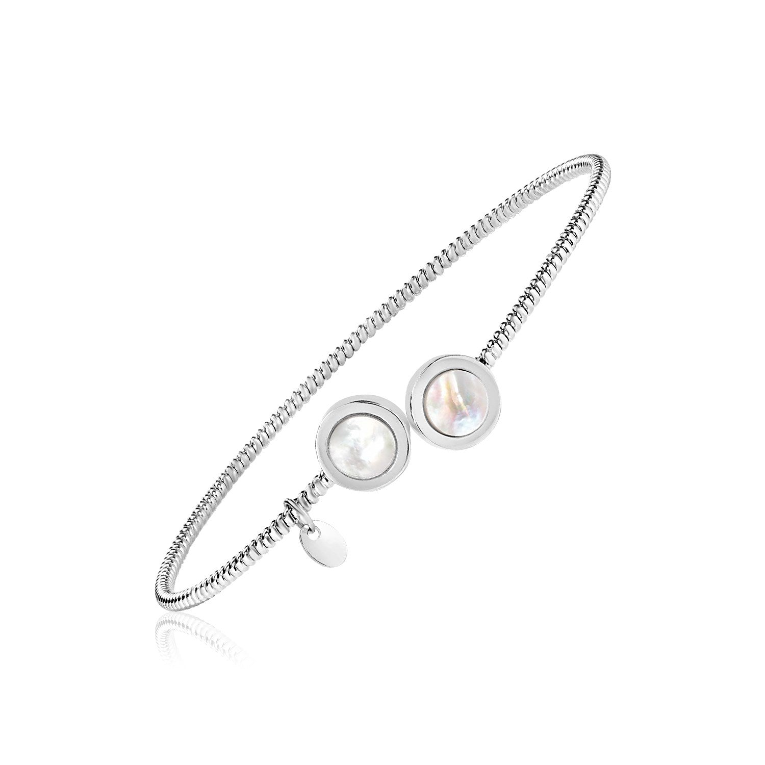 Sterling silver bangle with two mother-of-pearl circles and a small silver tag.