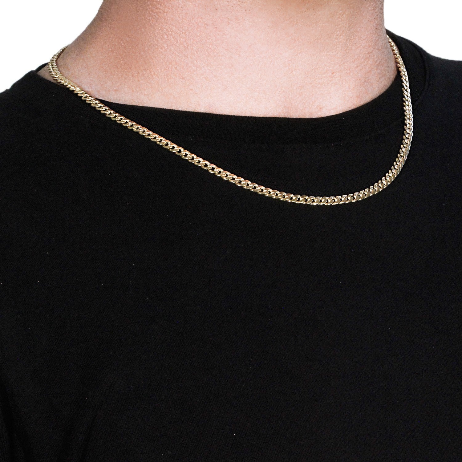 A 10k yellow gold Miami Cuban semi-solid chain, 4.5mm wide, worn around a neck.