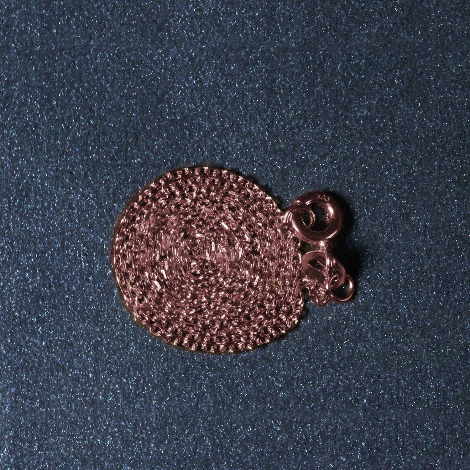 18k rose gold diamond cut cable link chain with a spring ring clasp.