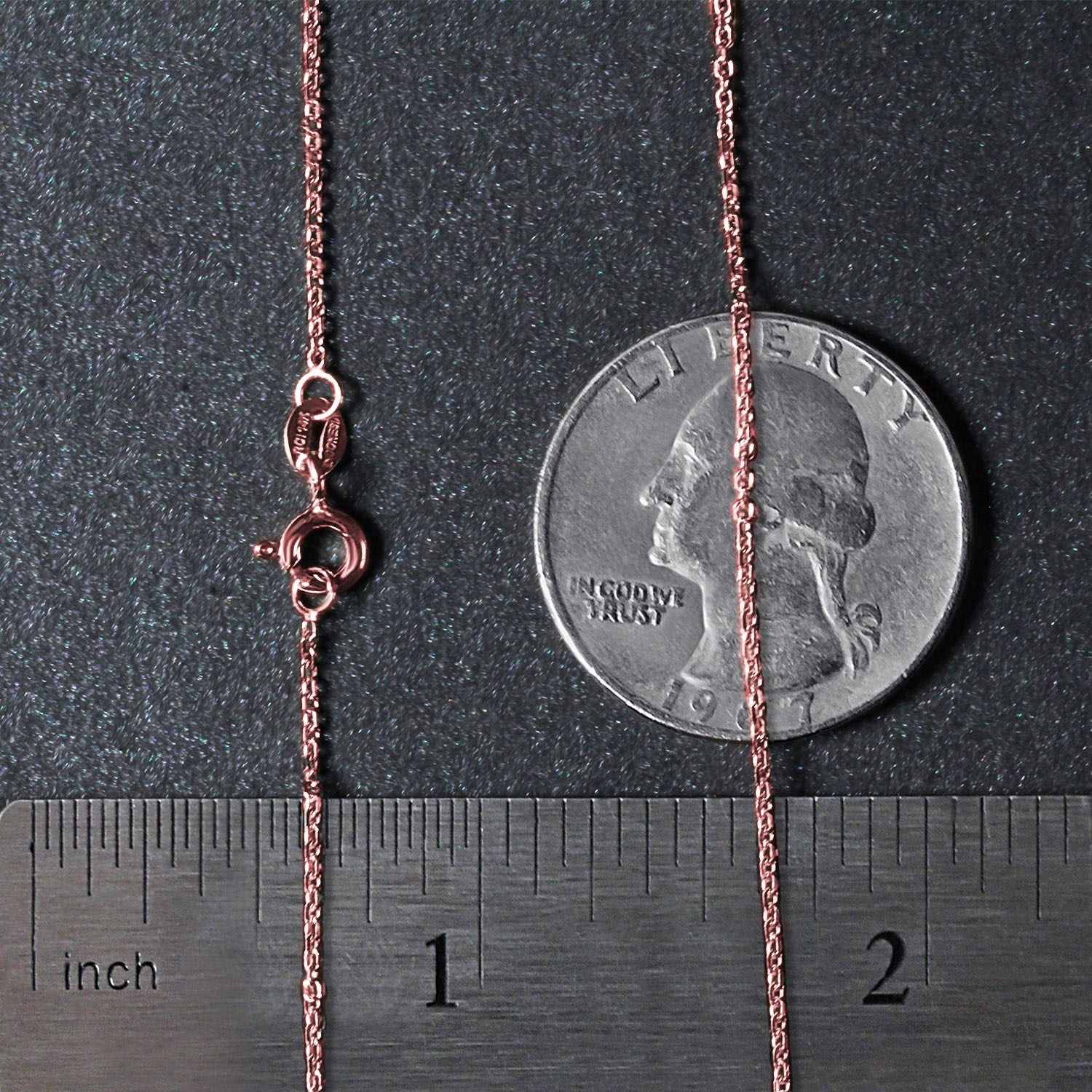 18k rose gold diamond cut cable link chain with a spring ring clasp.