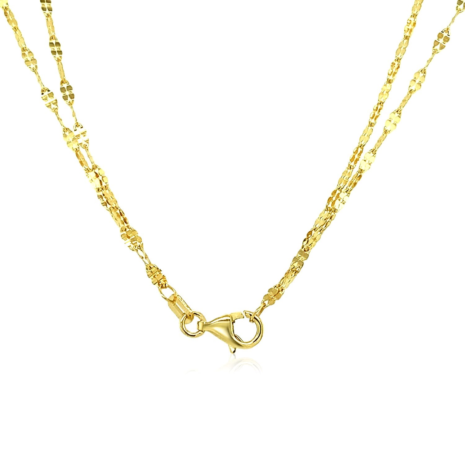 14k yellow gold double strand chain necklace with a lobster clasp.