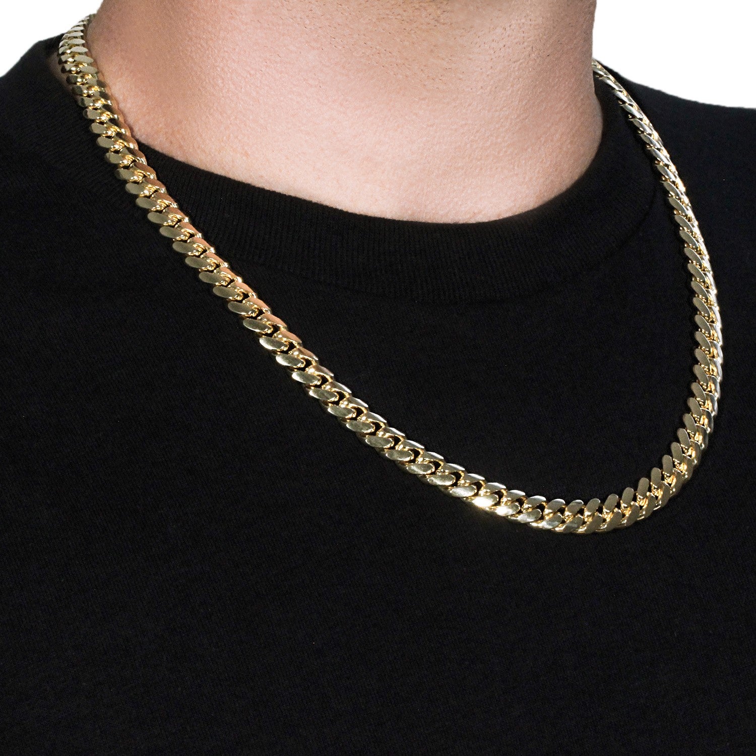 14k yellow gold classic Miami Cuban solid chain, 9.20 mm wide, worn on a person.