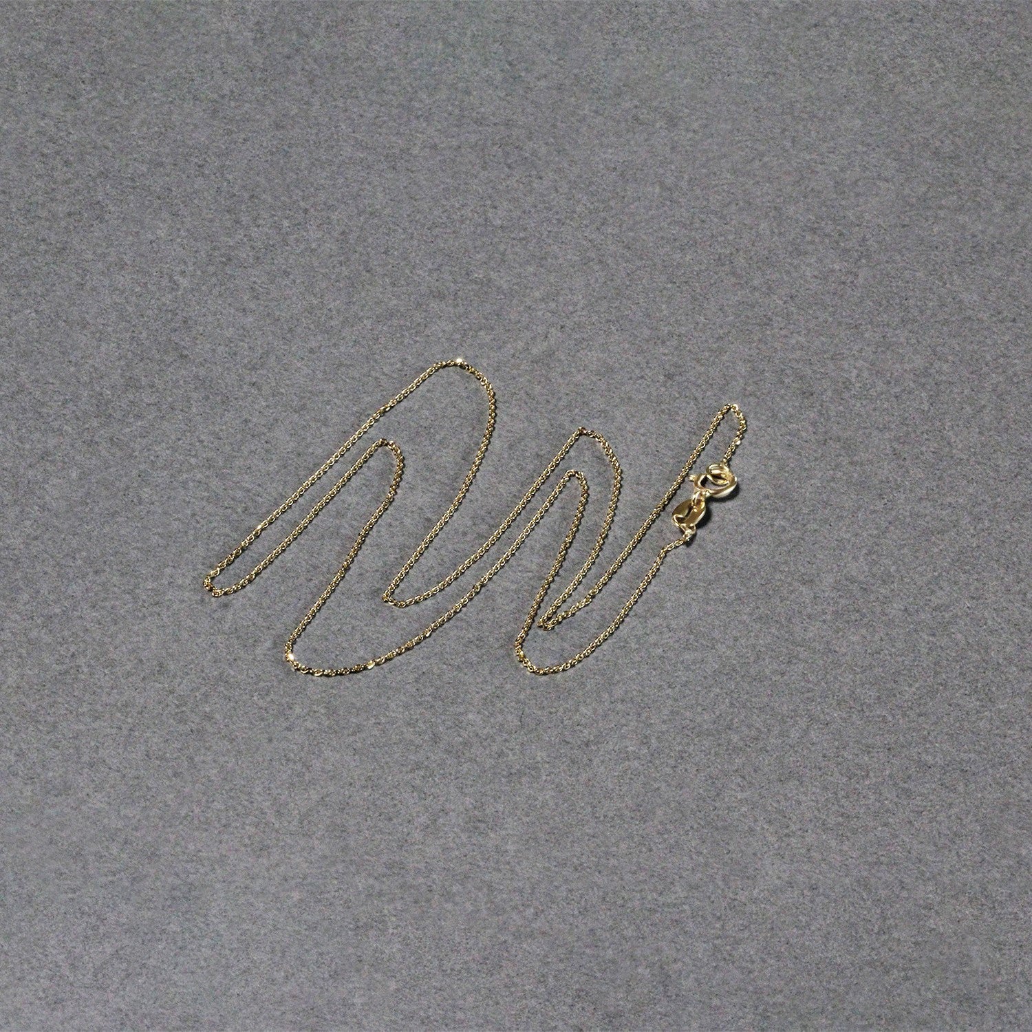 14k yellow gold diamond cut cable link chain with a spring ring clasp.