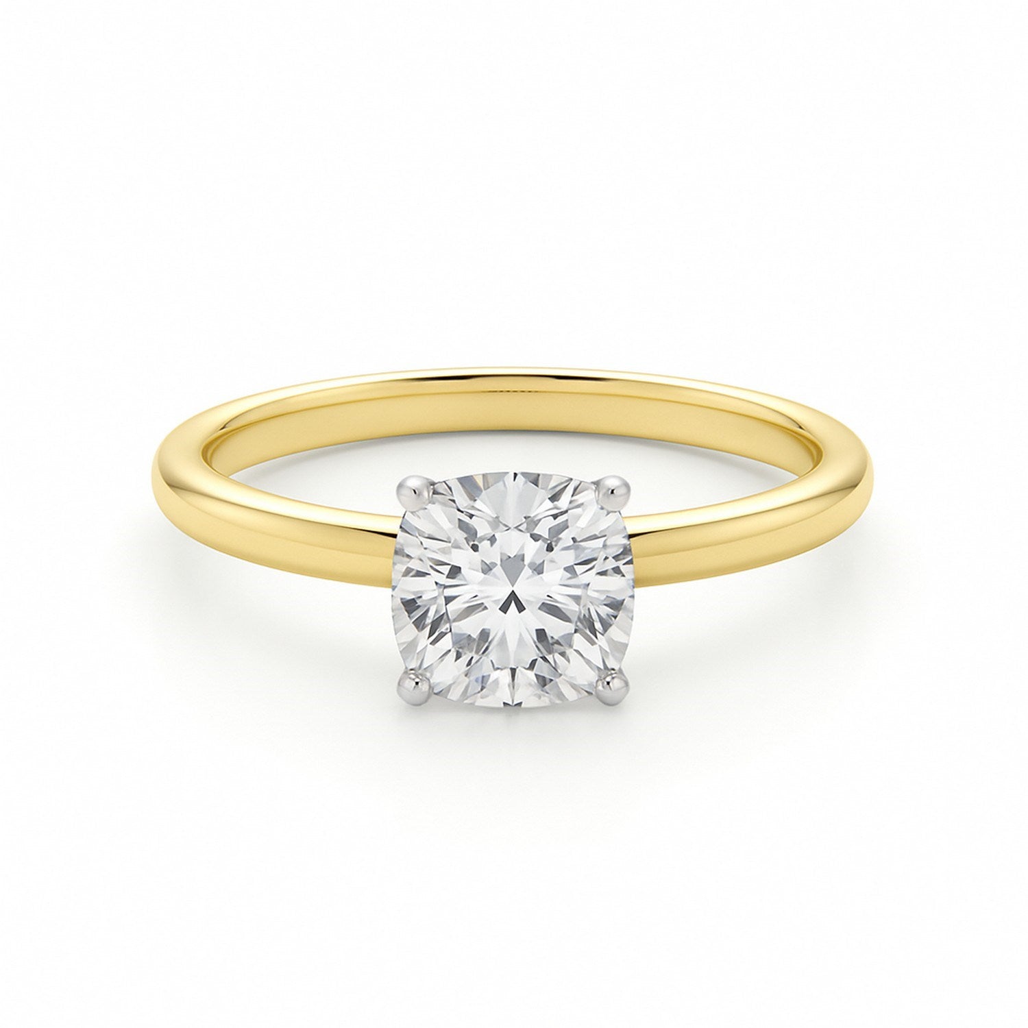 A 1 carat cushion lab grown diamond solitaire ring in 10K yellow gold.