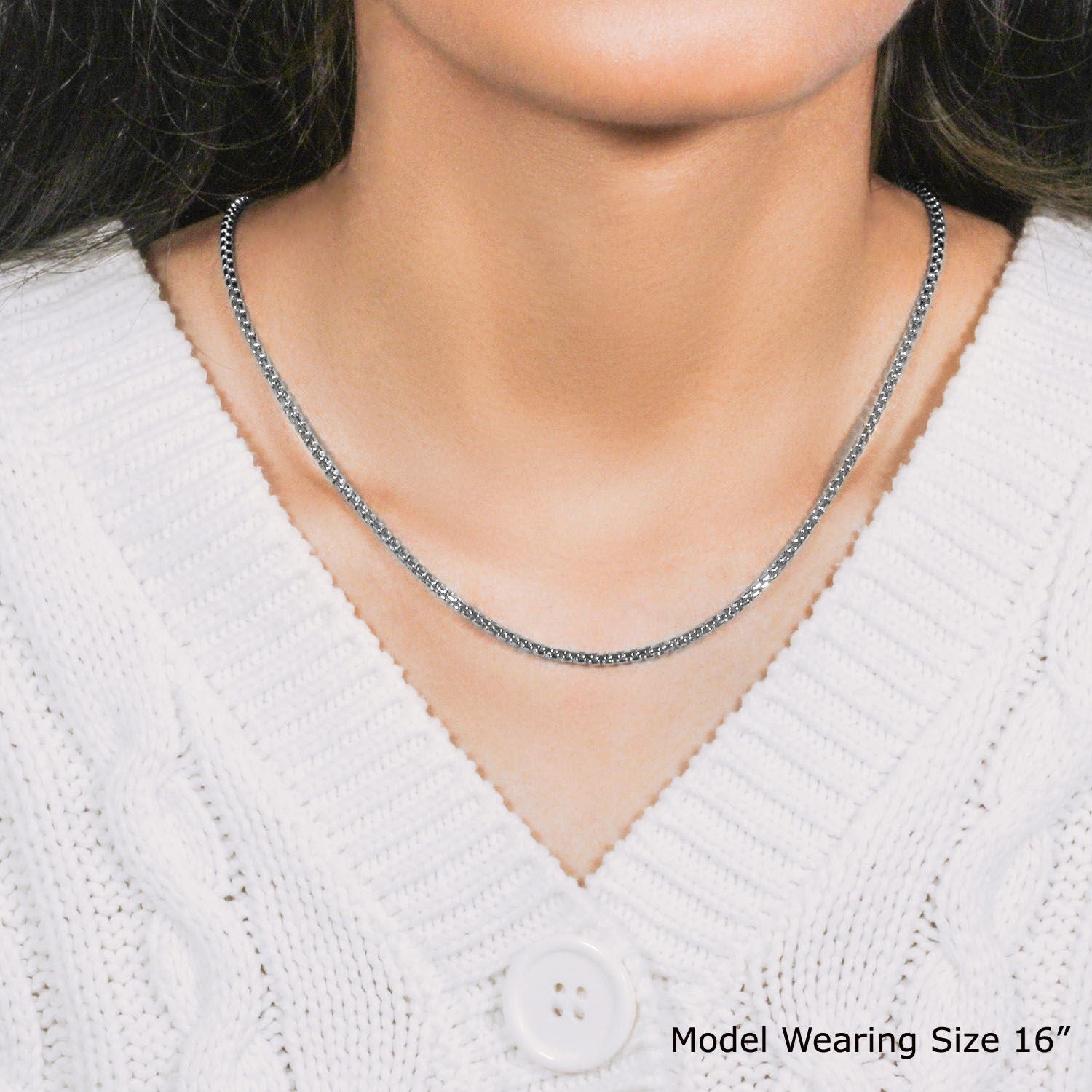 A woman wears a 14k white gold solid round box chain.