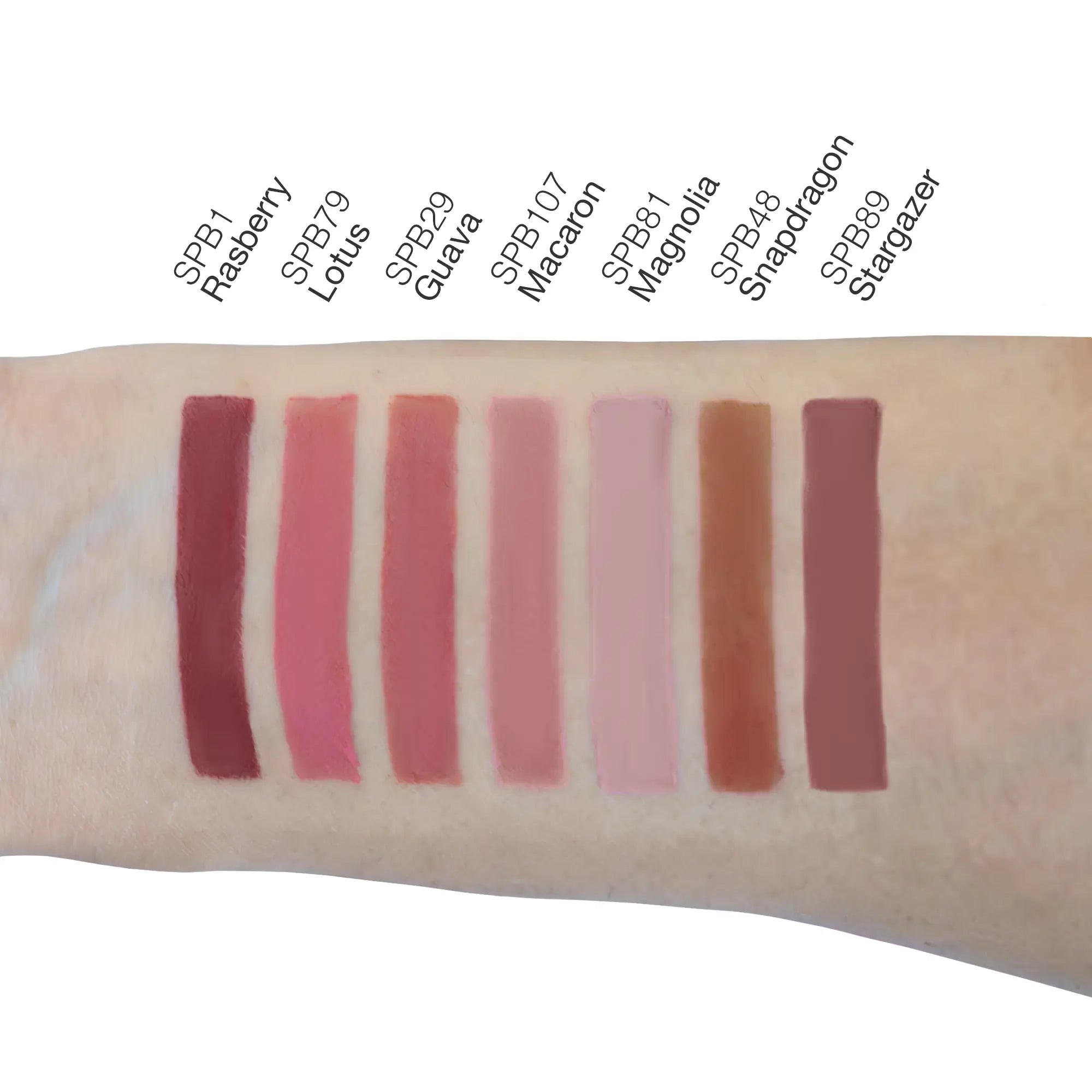 Arm swatches of eight matte liquid lipsticks in various shades of pink and brown.