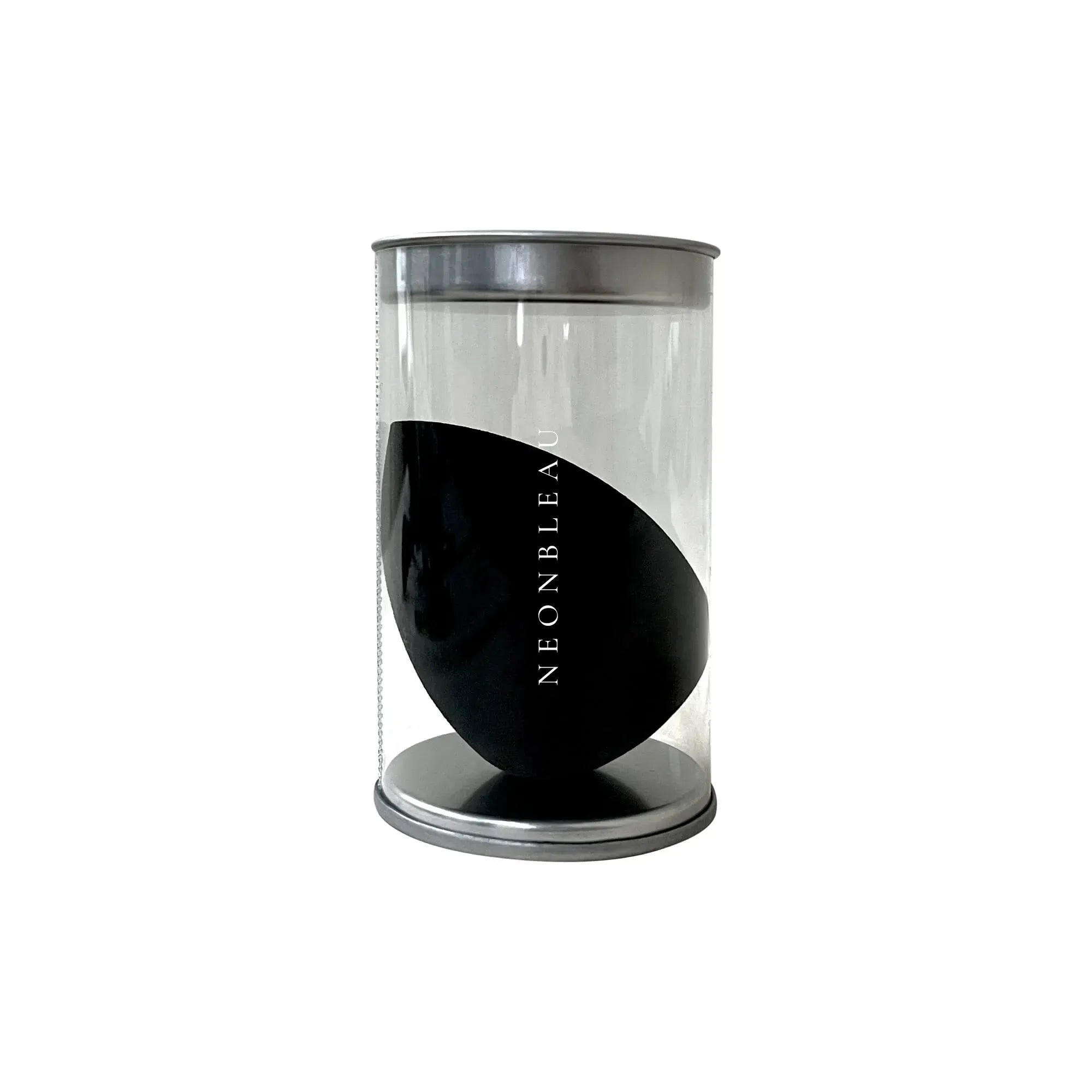 A black makeup blender with "NEONBLEAU" printed on it, in a clear cylindrical container.