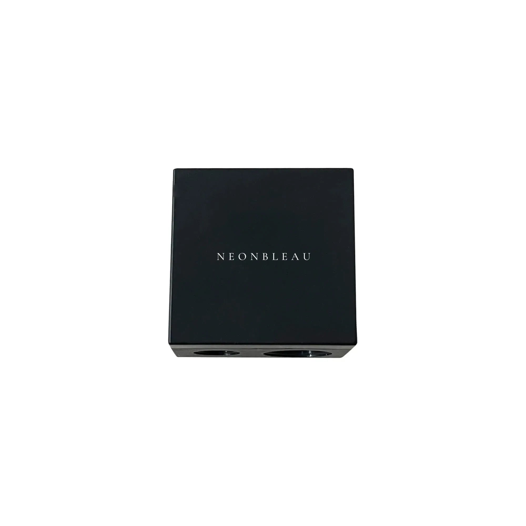 Black dual pencil sharpener with "NEONBLEAU" printed on top.