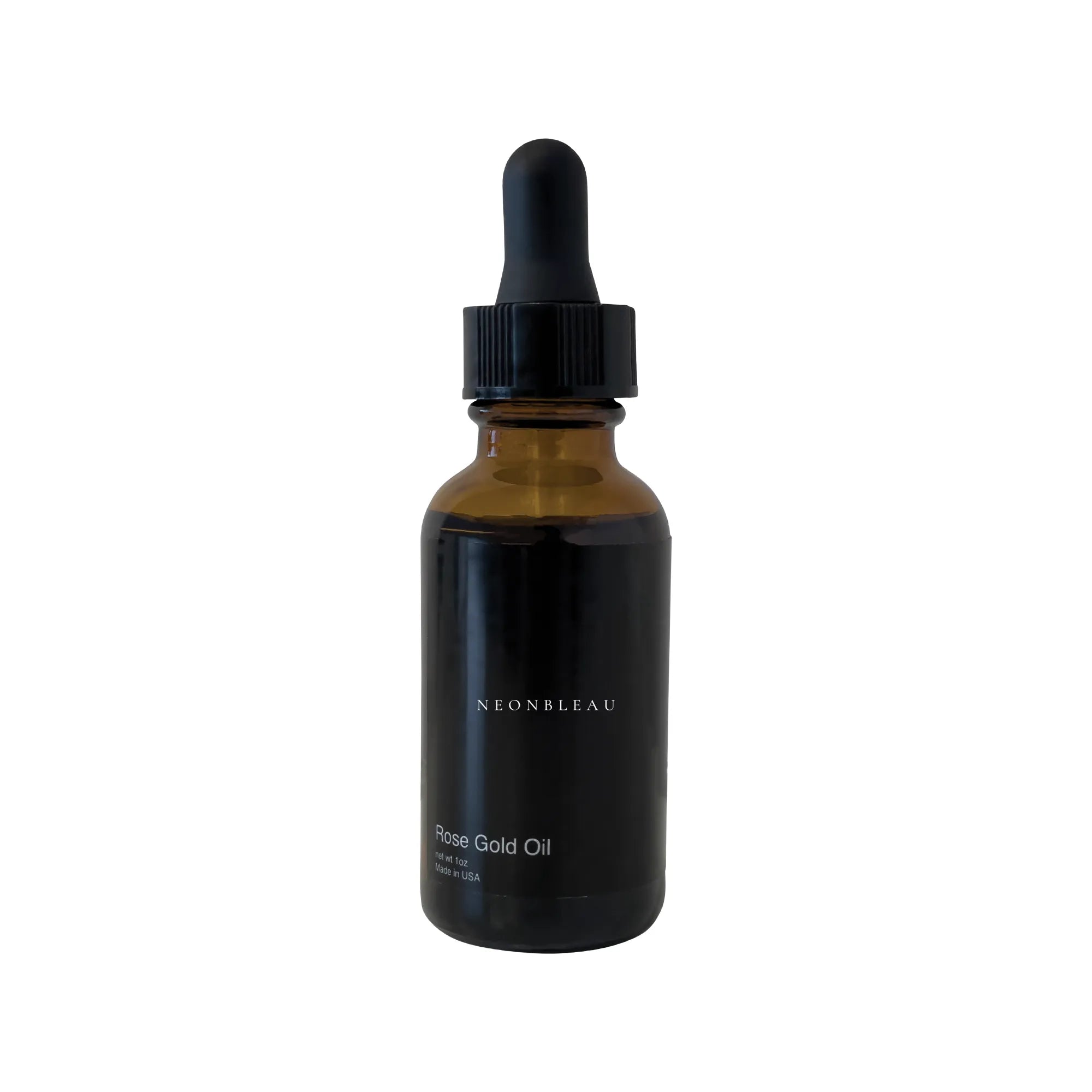A dark amber dropper bottle of Neonbleu Rose Gold Oil.