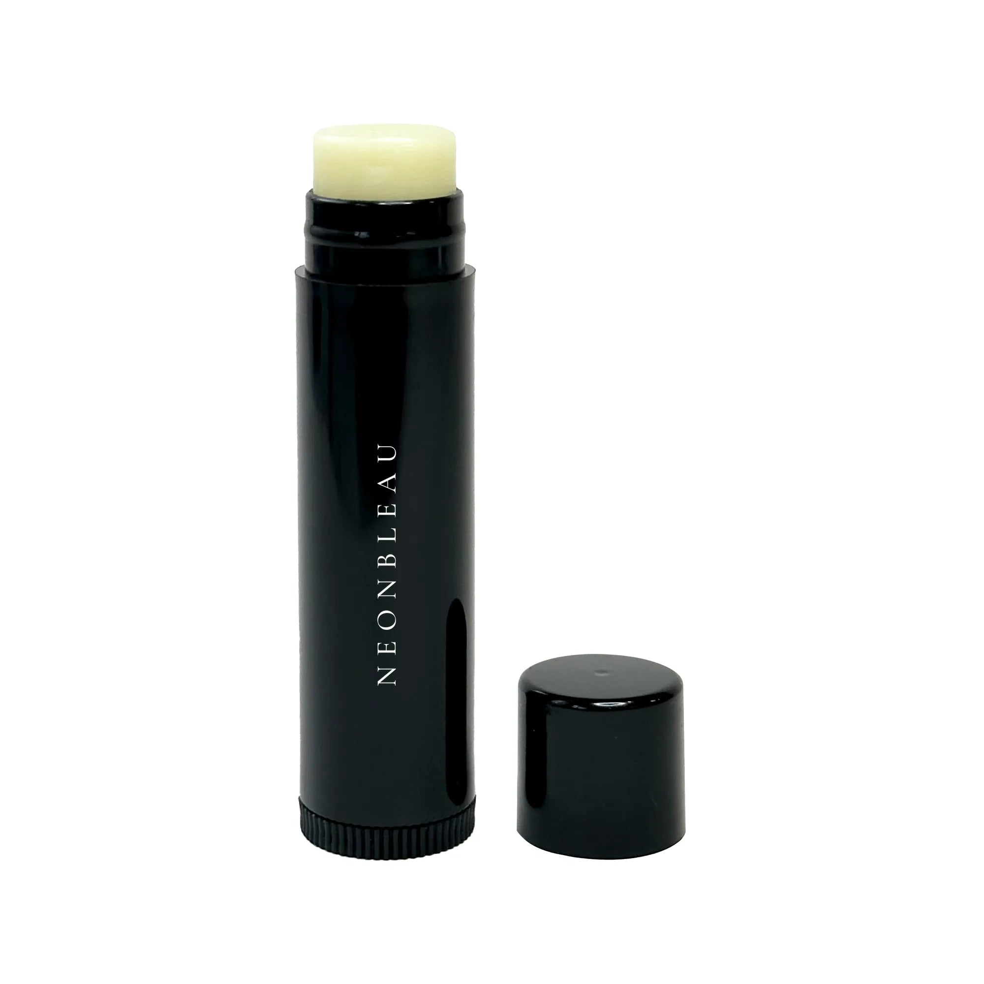 Black tube of vegan lip balm with the cap off, revealing the light yellow balm.