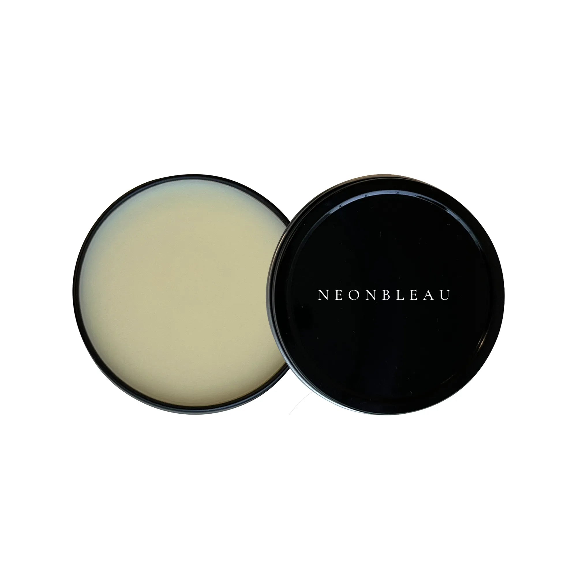 An open black tin of beard butter next to its black lid with "NEONBLEAU" printed on it.