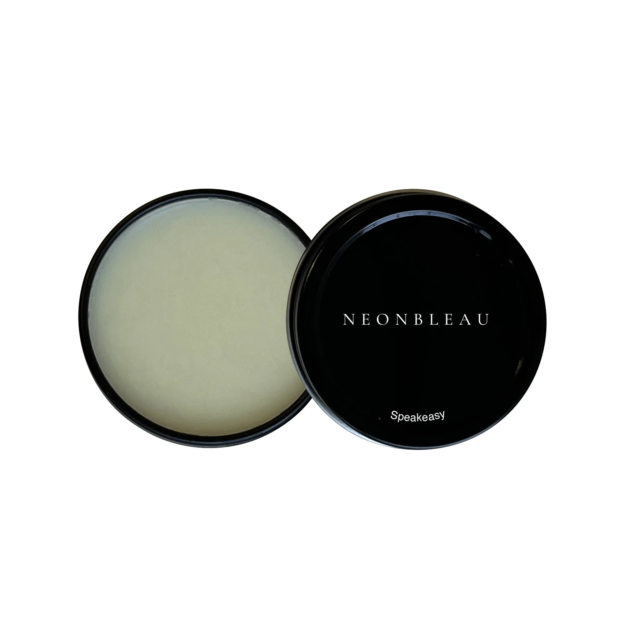 An open black tin of solid fragrance with a black lid showing "NEONBLEAU Speakeasy".