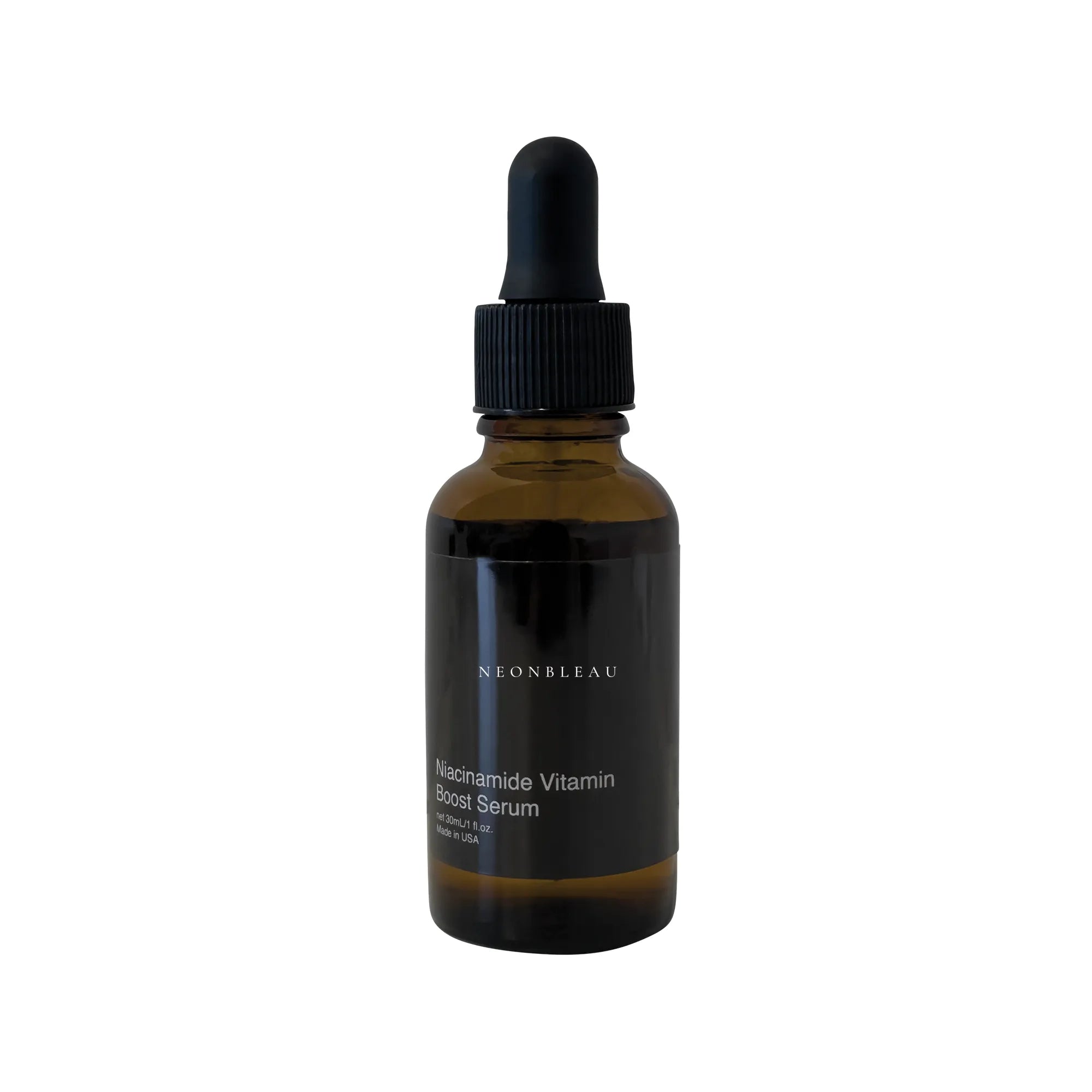 Niacinamide Vitamin Boost Serum in a dark amber dropper bottle.