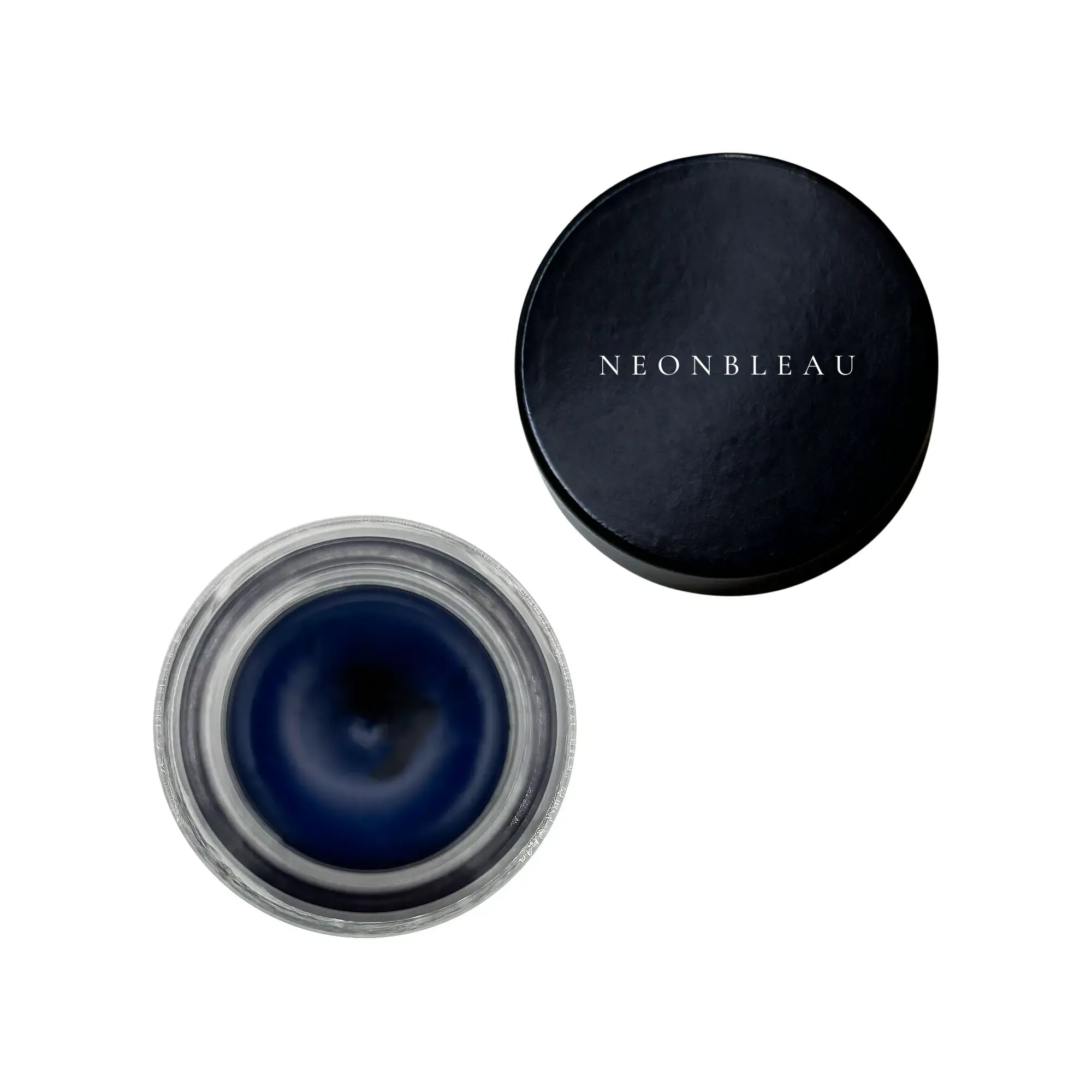 Navy gel eyeliner in an open jar with a black lid.