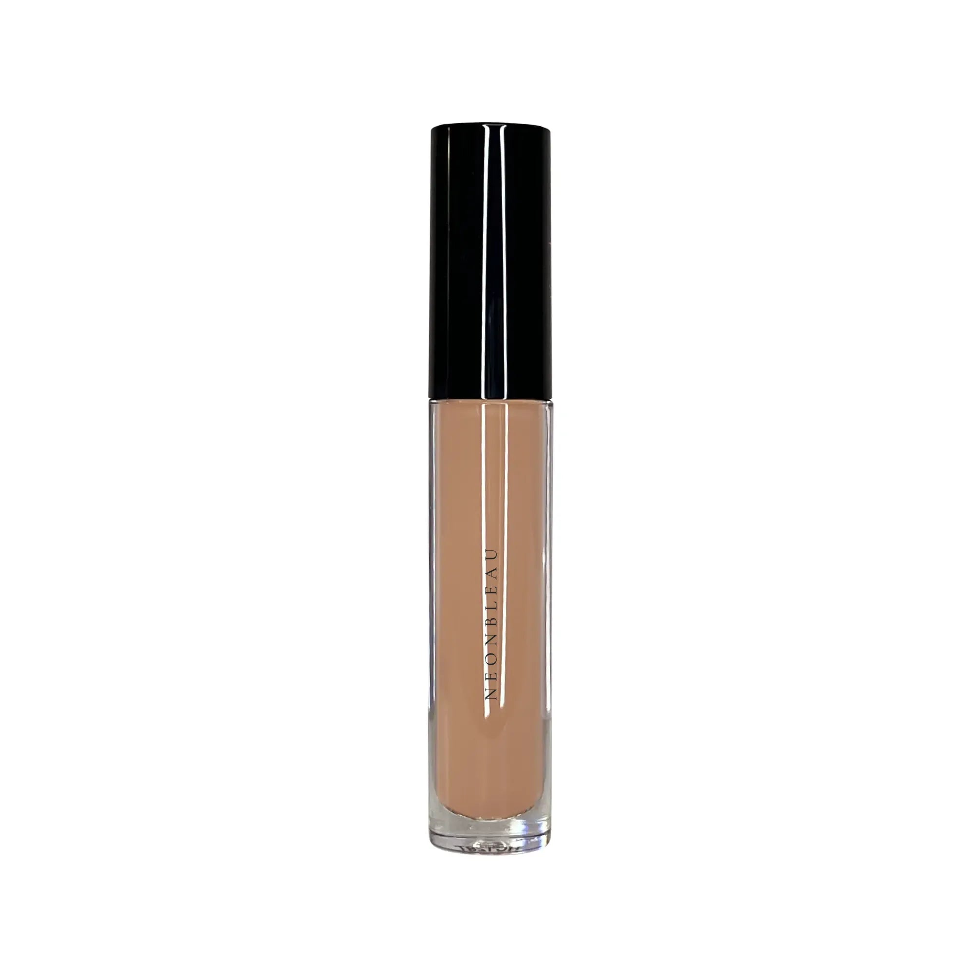 A tube of Loom concealing cream with a black cap and a beige liquid.