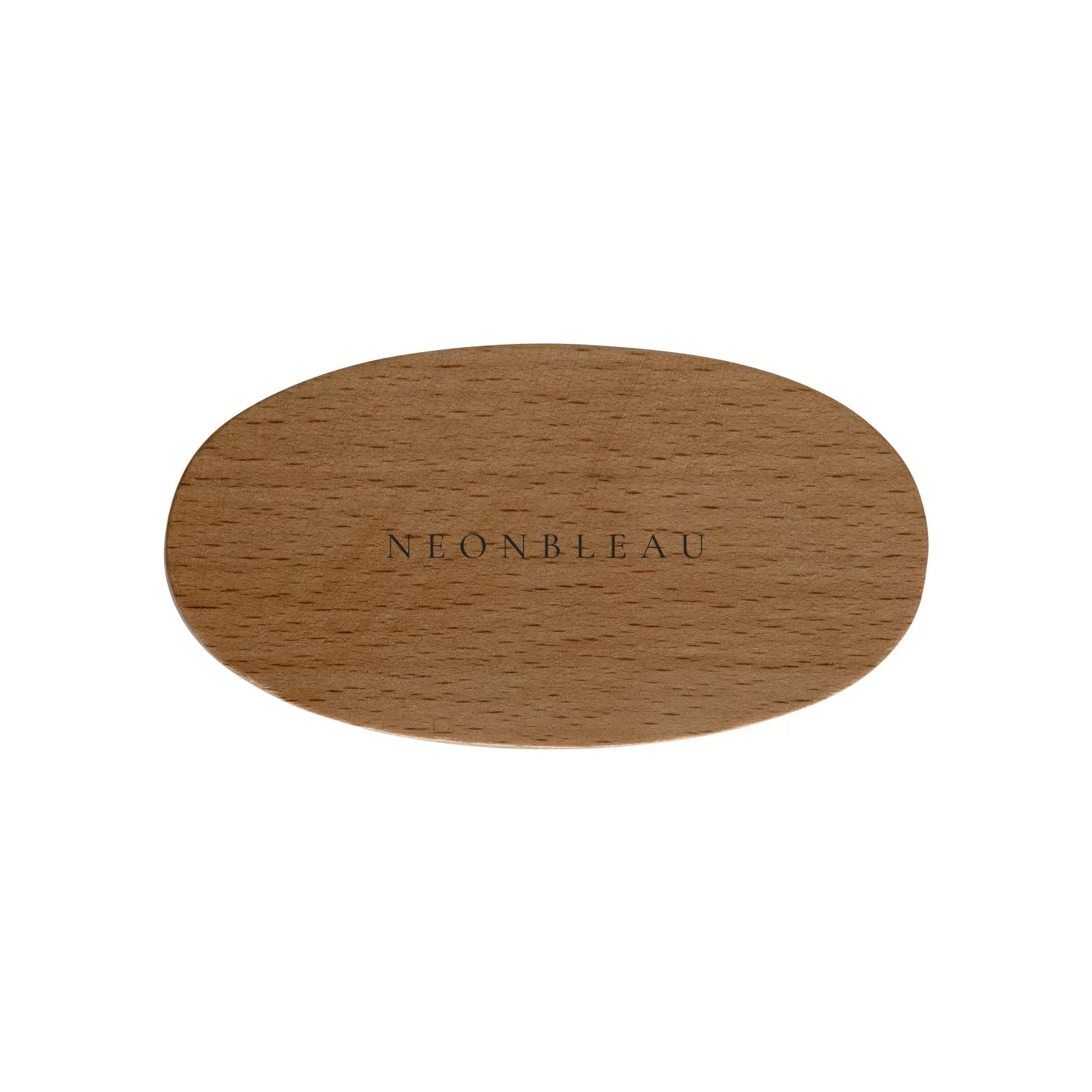 An oval wooden beard brush with "NEONBLEAU" engraved on it.