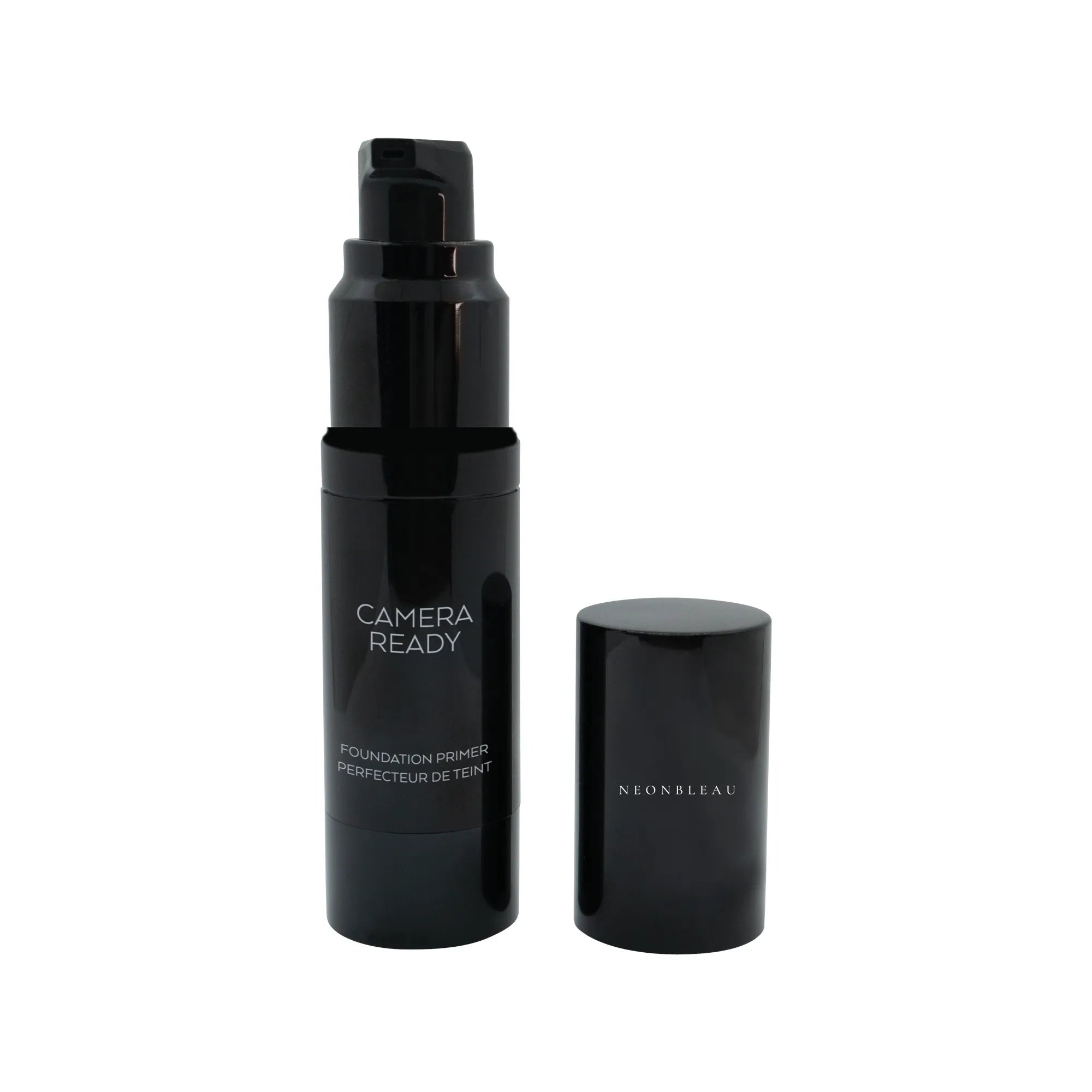 A black pump bottle of "Camera Ready Foundation Primer" with its cap off, standing next to it.