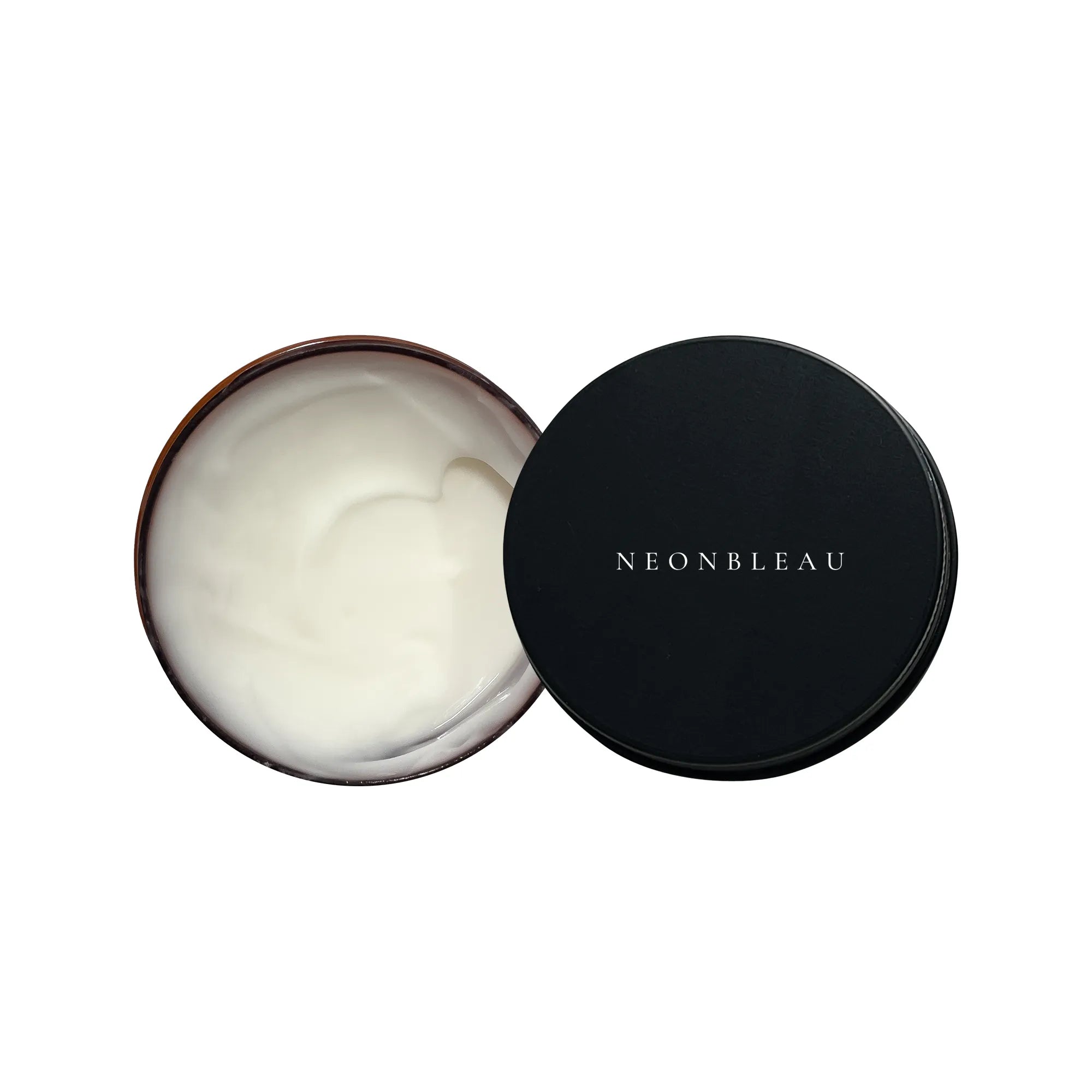 An open jar of under-eye cream with a black lid displaying "NEONBLEAU".