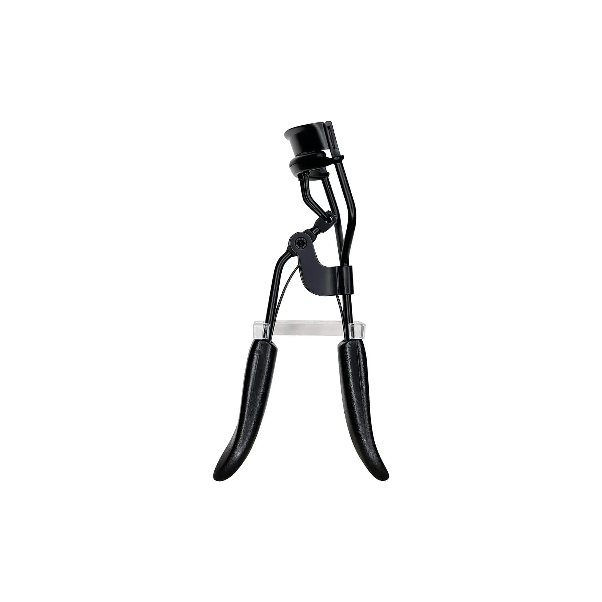 Black padded eyelash curler.