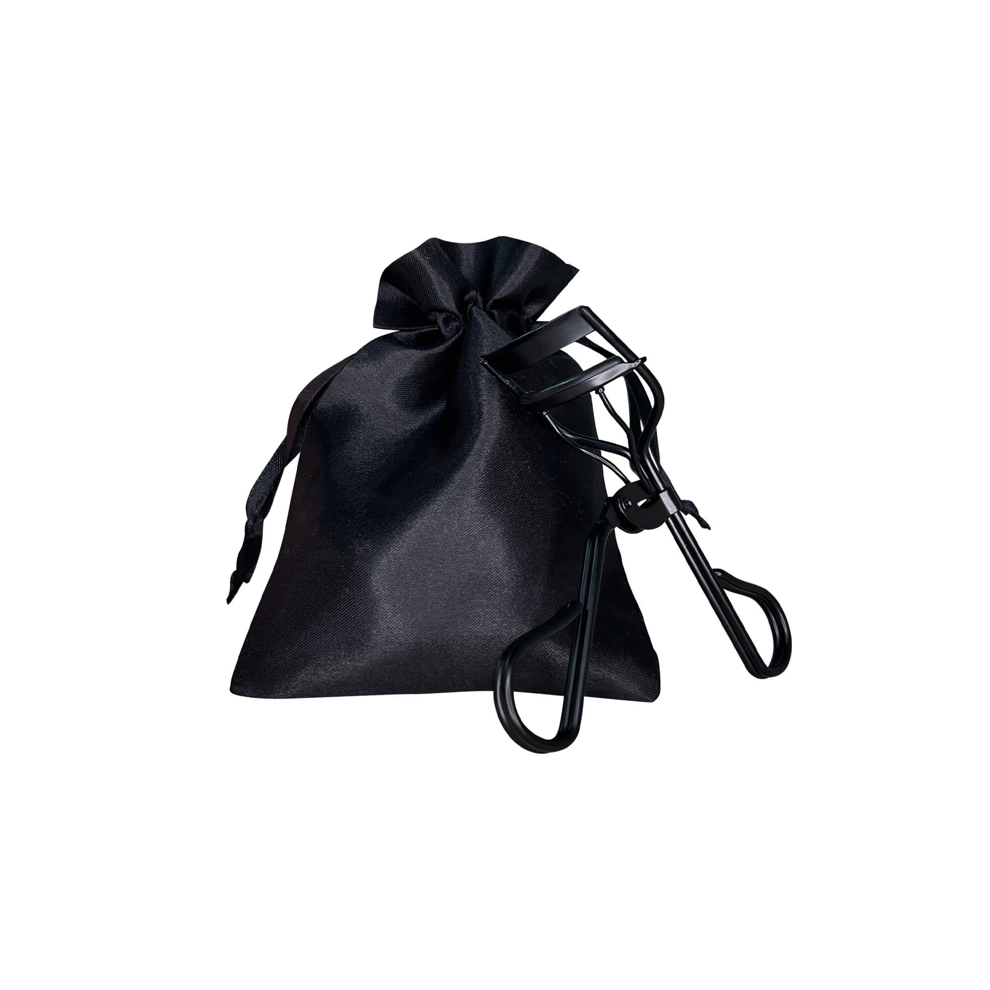 Black eyelash curler with a black satin drawstring pouch.