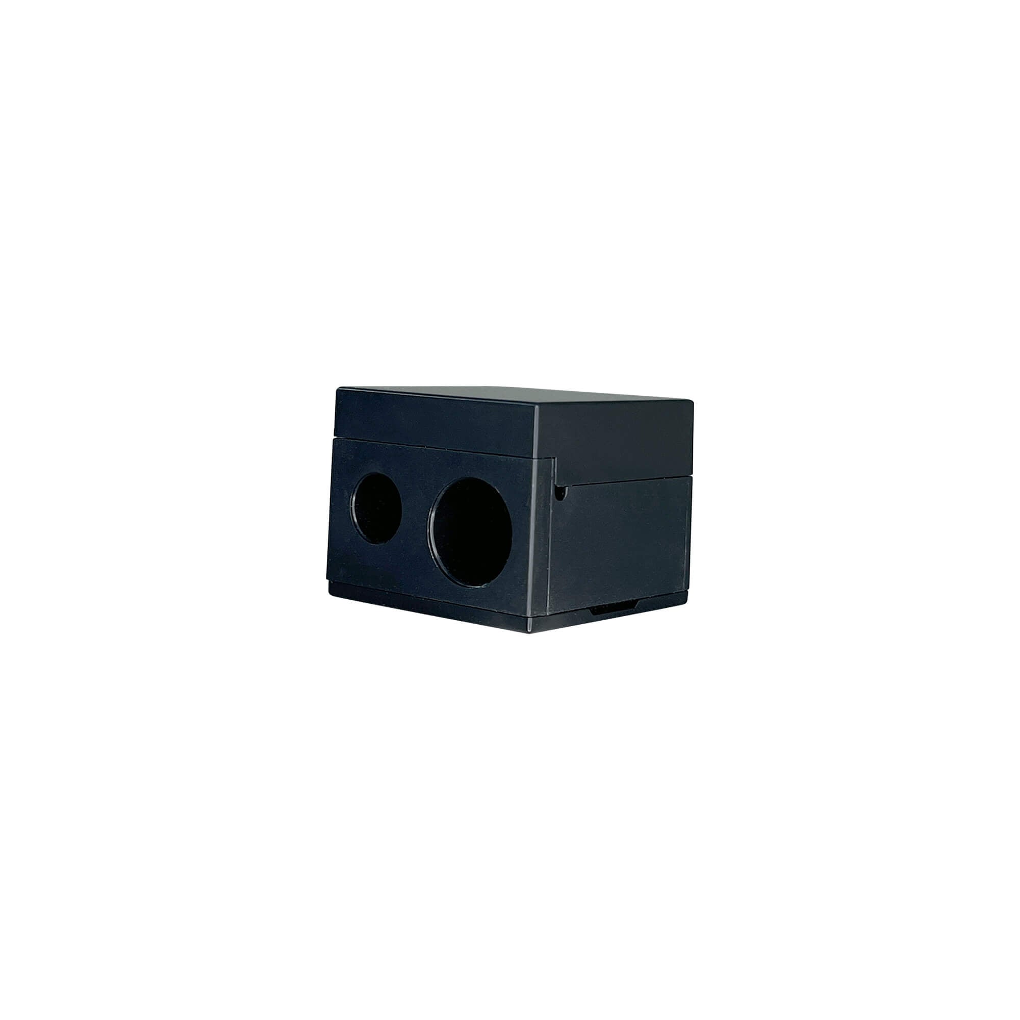 Black dual pencil sharpener with two circular openings.